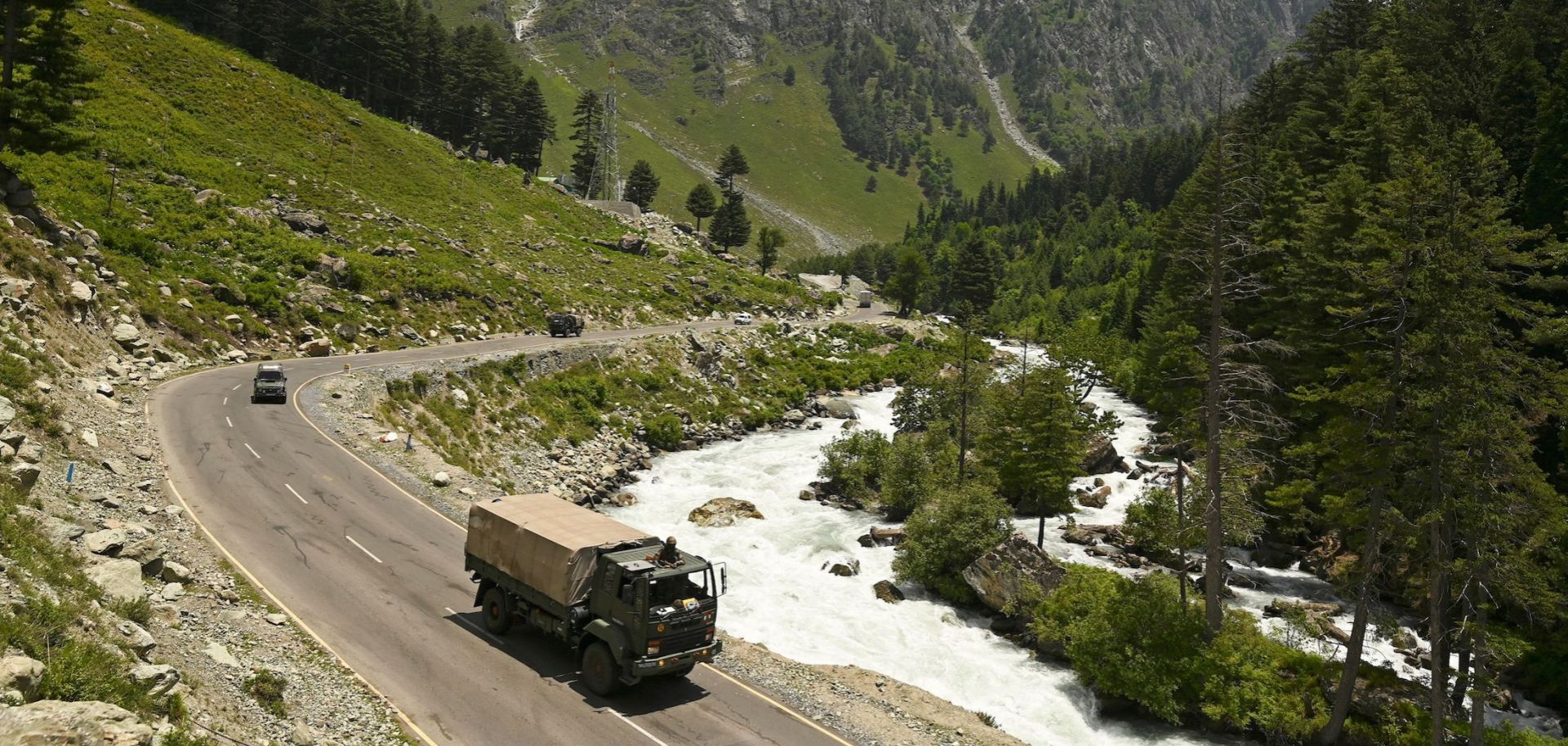 An Indian army convoy makes its way toward Leh, a town near the Chinese border in Ladakh, on June 17, 2020. 