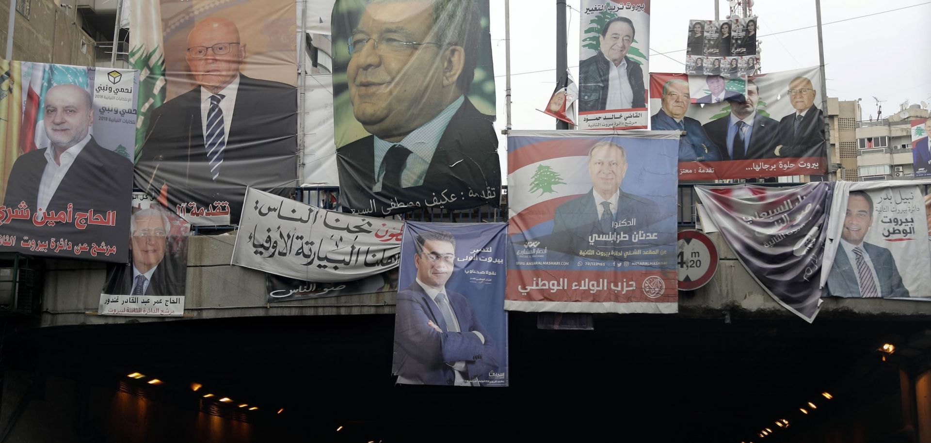 Campaign posters slung from a tunnel entrance in Beirut depict candidates in Lebanon's parliamentary election, which took place May 6.