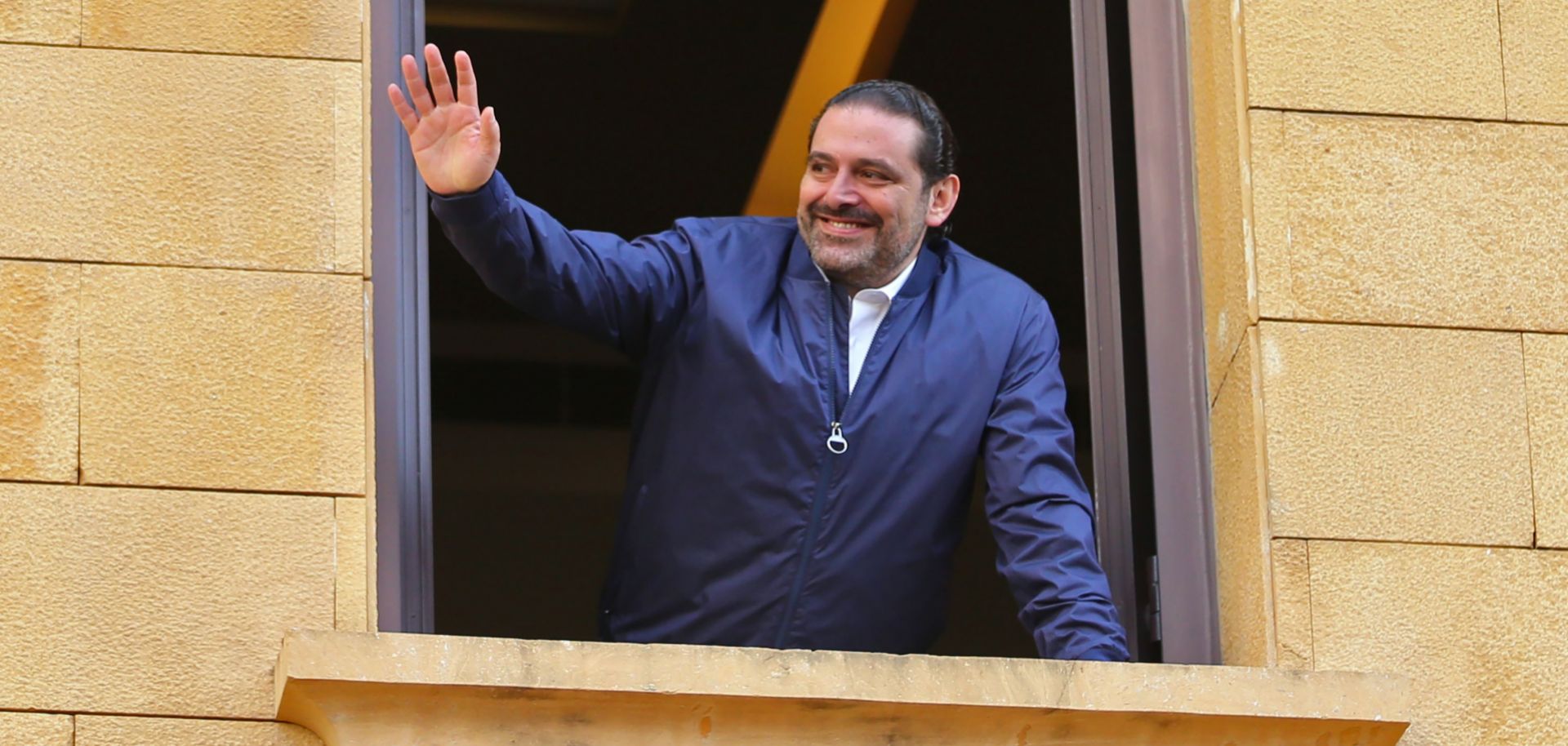 Lebanese Prime Minister Saad al-Hariri greets supporters in Beirut on Nov. 22, 2017.