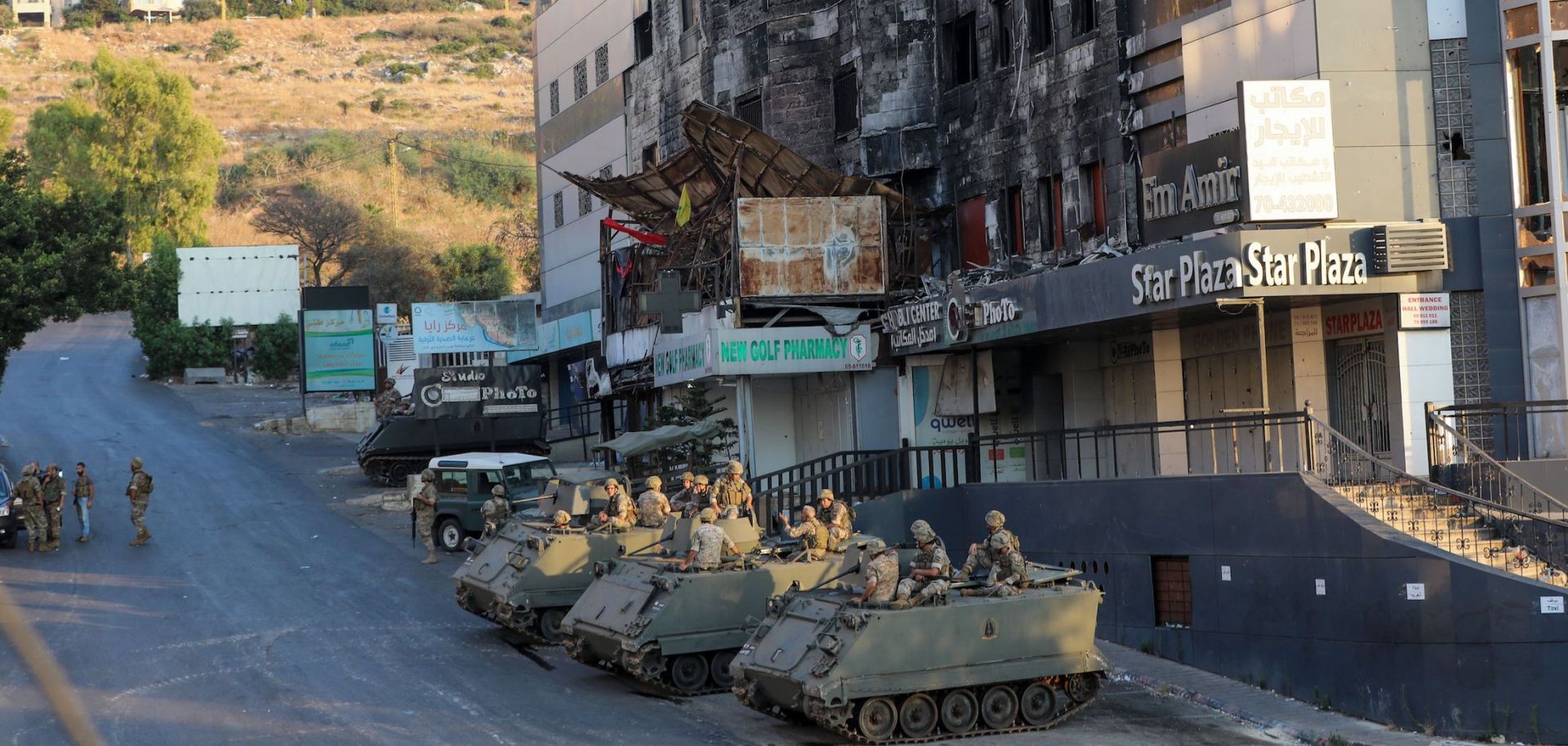 A photo shows Lebanese soldiers stationed in armored vehicles amid clashes in Khalde on Aug 1, 2021. 