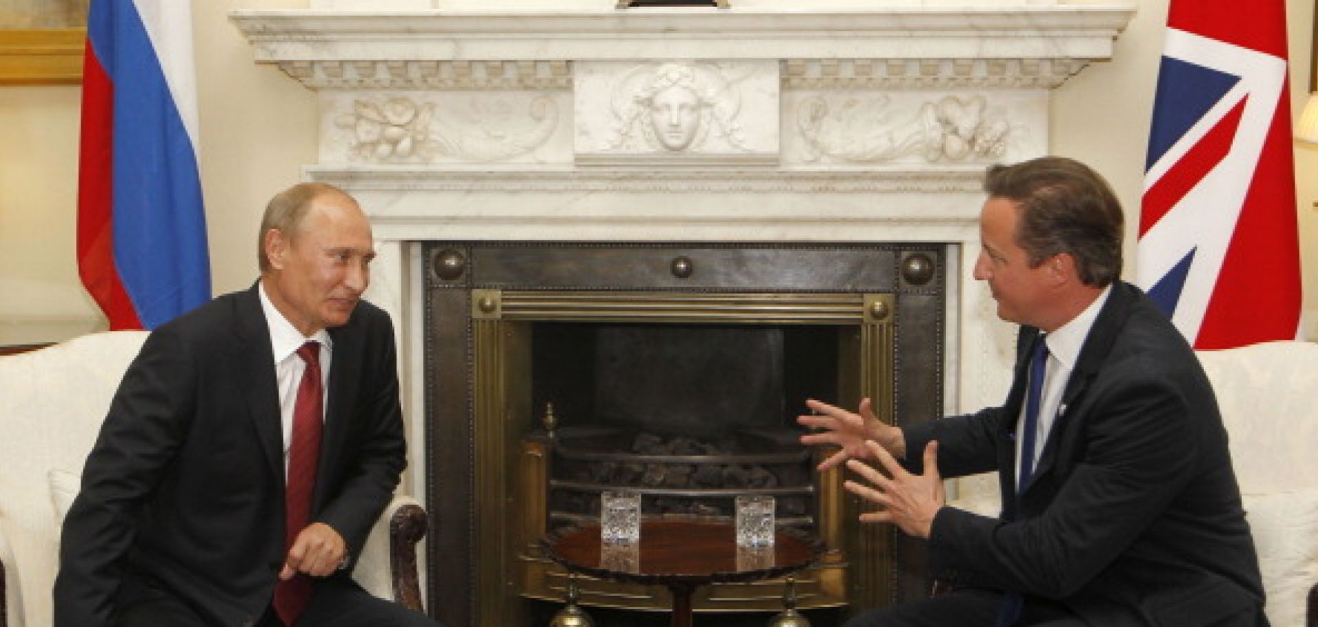 Russian President Vladimir Putin (L) and British Prime Minister David Cameron in London on Aug. 2, 2012