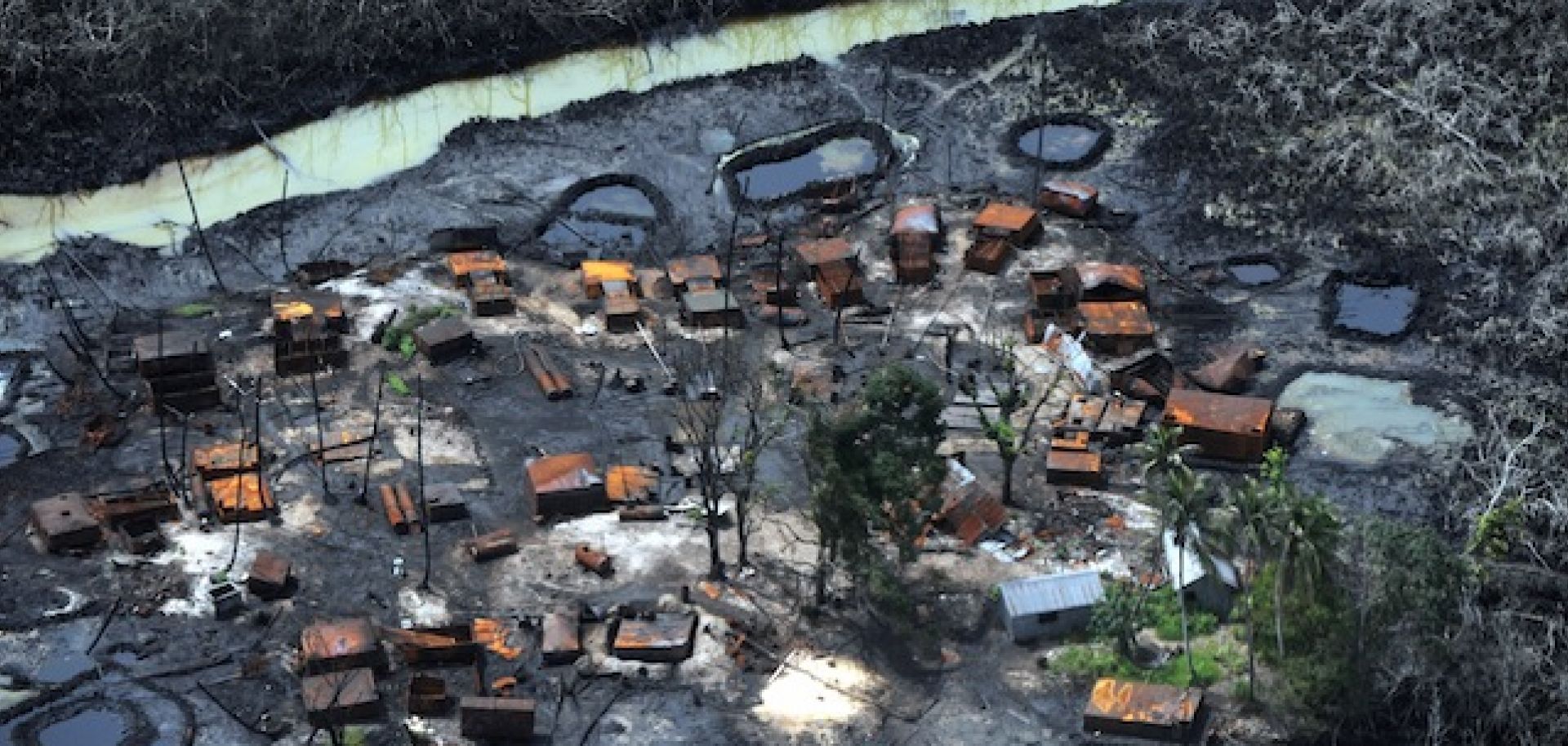 An illegal oil refinery that was destroyed by Nigerian forces at Nembe Creek in the Niger Delta on March 22.