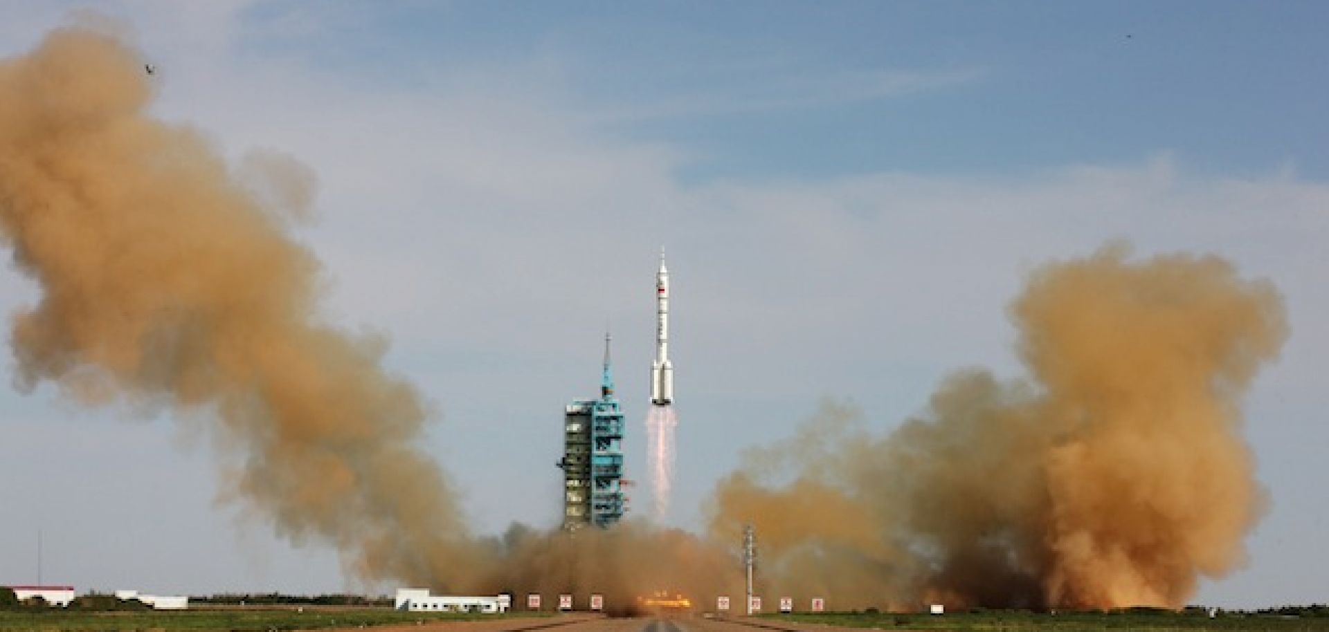 The rocket carrying the Shenzhou 10 spacecraft blasts off June 11.