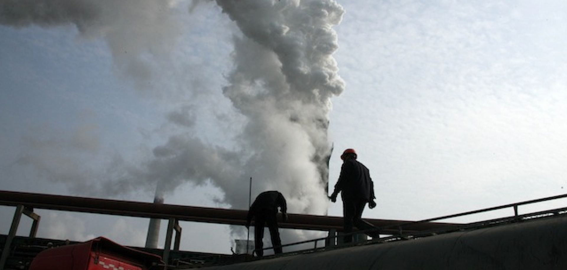 Workers at a coal chemical factory in Anhui province, China, in August 2013.