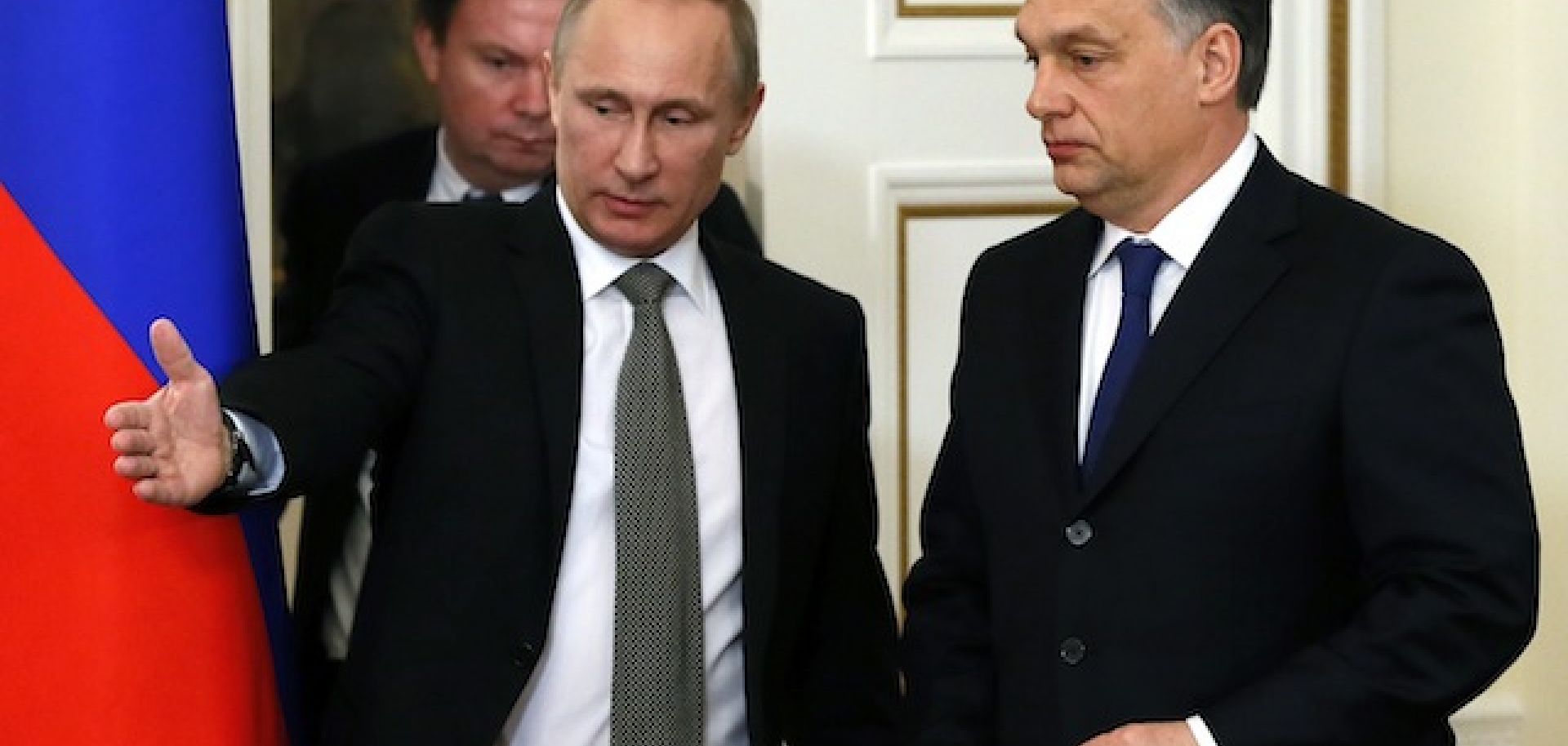Russia's President Vladimir Putin (L) and Hungary's Prime Minister Viktor Orban (R) speak during a meeting at Putin's residence outside Moscow, on January 14, 2014.
