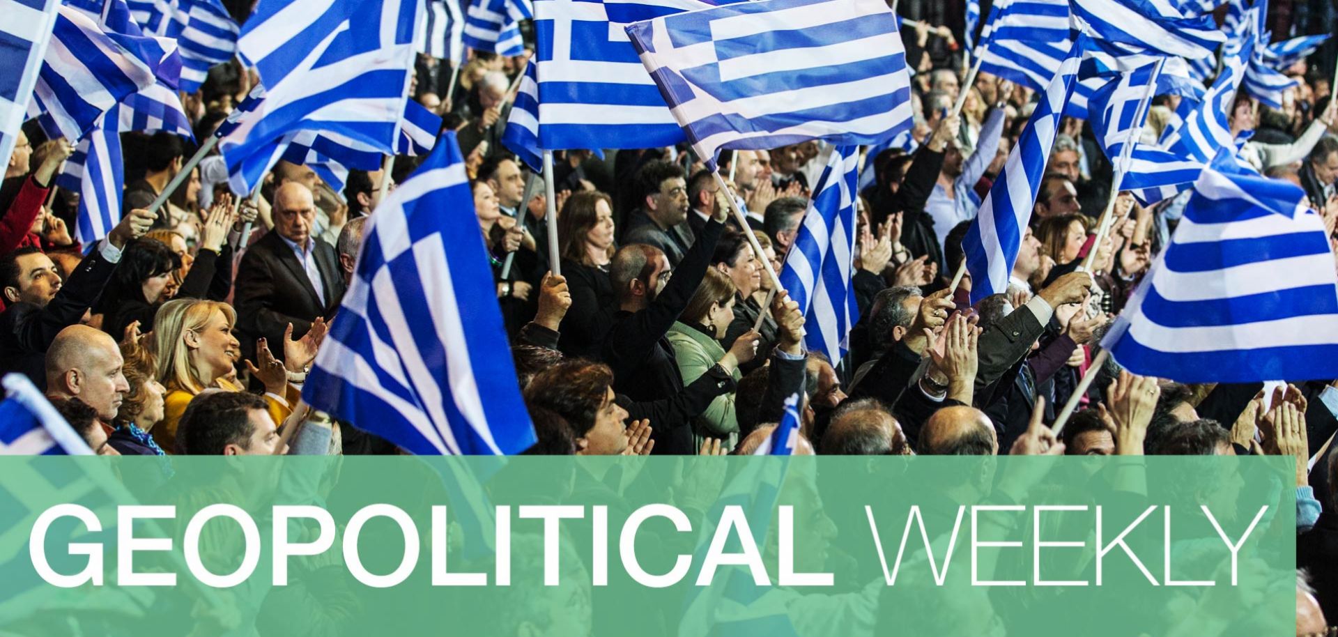 Supporters cheer as former Greek Prime Minister Antonis Samara arrives for a speech ahead of Greece's elections in early 2015.