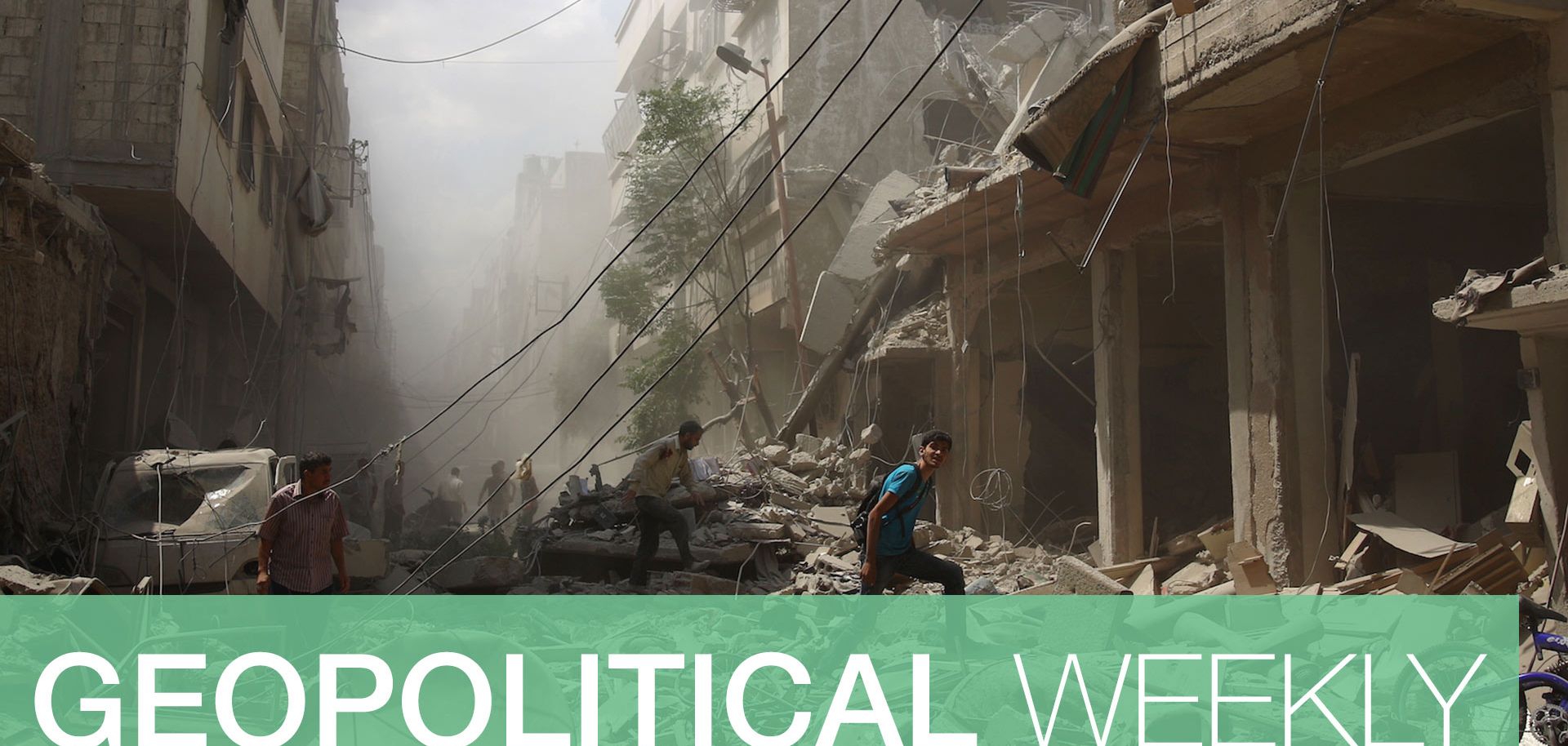 Syrians walk amid the rubble of buildings hit by government airstrikes in rebel-controlled Douma, east of Damascus.