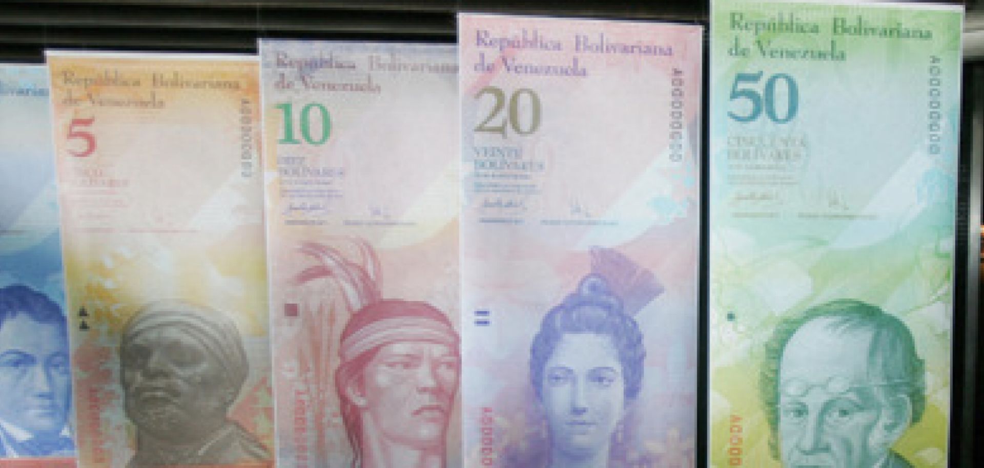 Large reproductions of the Venezuelan bolivar on display in Caracas