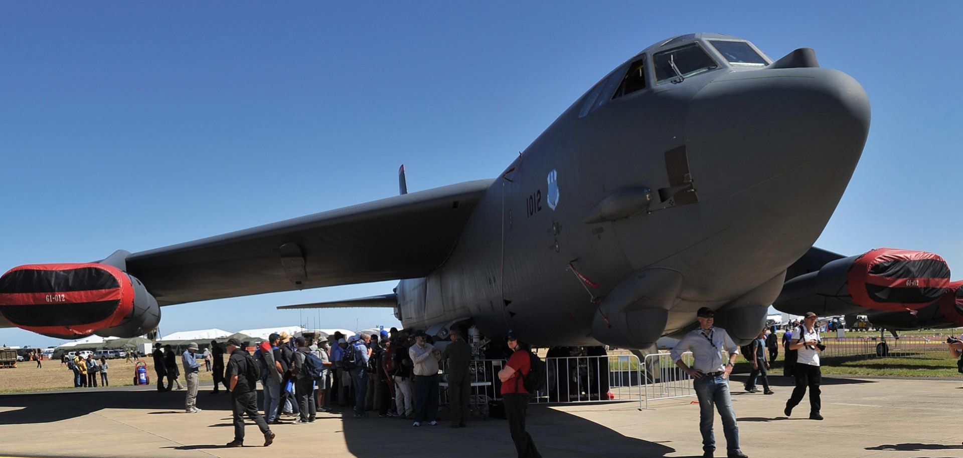 Patrons line up to look through a US Air Force B-52 bomber during the Australian International Airshow in Melbourne on March 1, 2013. 180,000 patrons are expected through the gates over the duration of the event staged at the Avalon Airfield some 80kms south-west of Melbourne. AFP PHOTO / Paul CROCK (Photo credit should read PAUL CROCK/AFP/Getty Images)