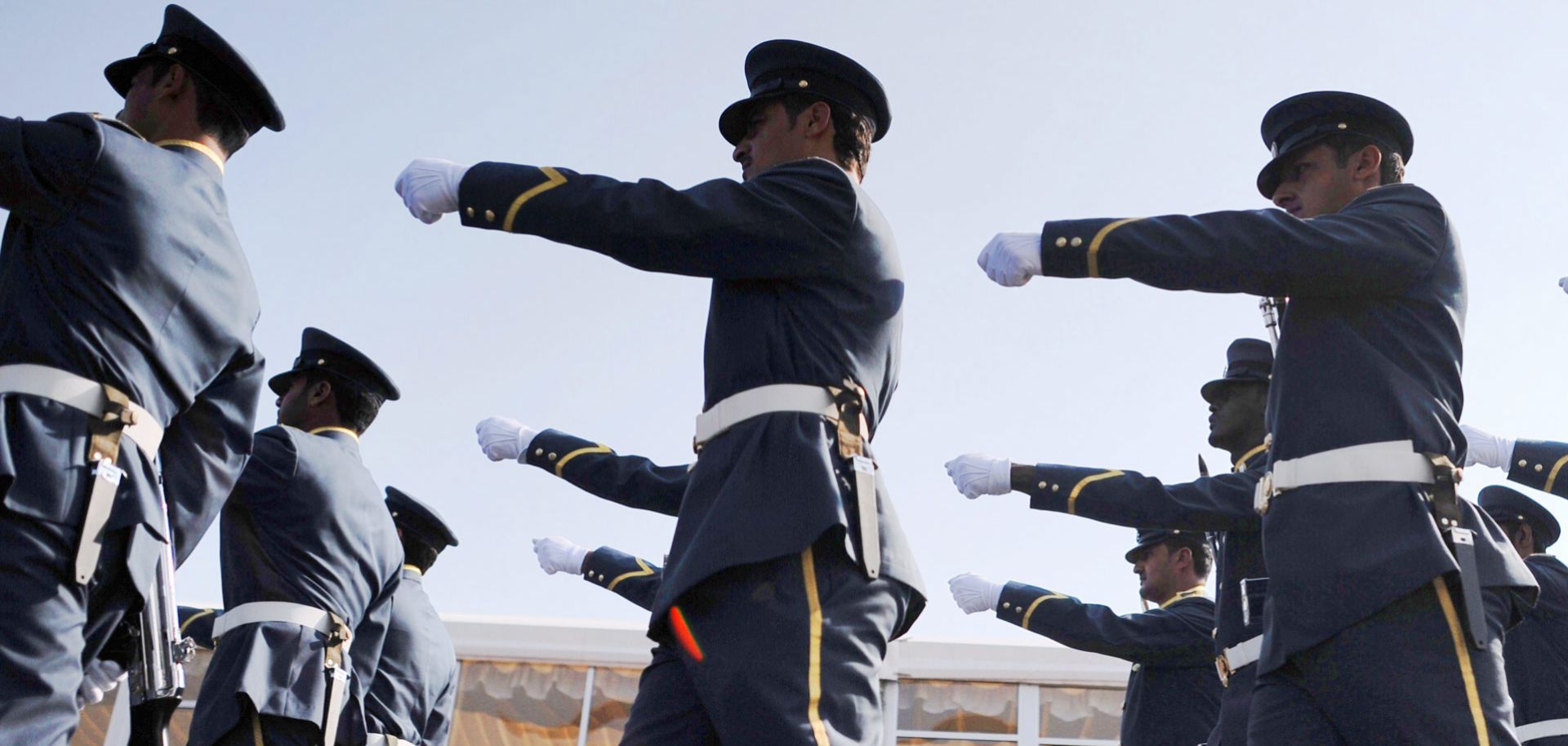 Bahrain Honor Guard parades ahead of the opening of the Bahrain International Airshow 2014 in Sakhir, south of Manama. (MOHAMMED AL-SHAIKH/AFP/Getty Images)