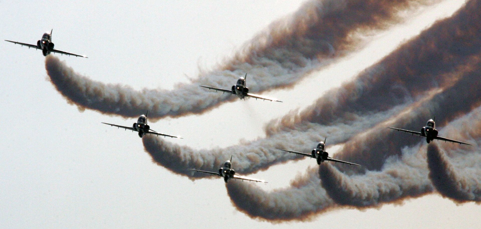 A Saudi air force demonstration squad flies in formation at a 2010 air show in Manama, Bahrain.
