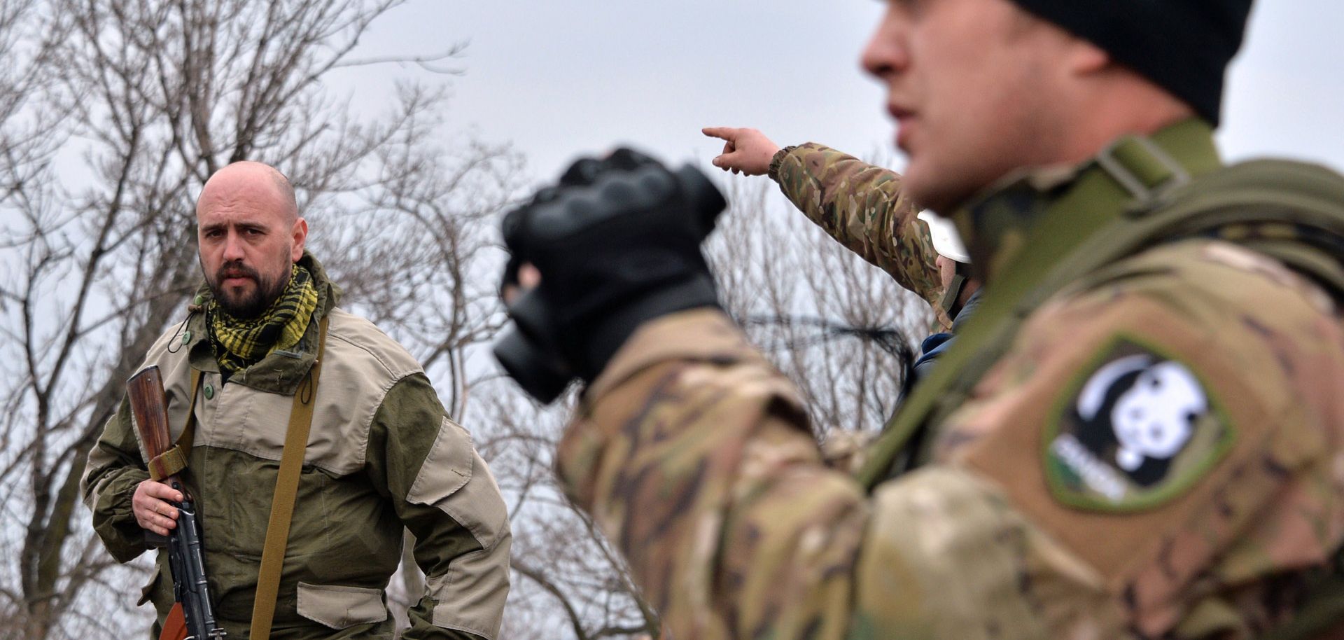 Ukrainian volunteers from the Dnipro-1 battalion, funded by Igor Kolomoisky to combat pro-Russia separatists, observes from a position in the village of Chermalyk 40 km northeast of Mariupol on February 26.