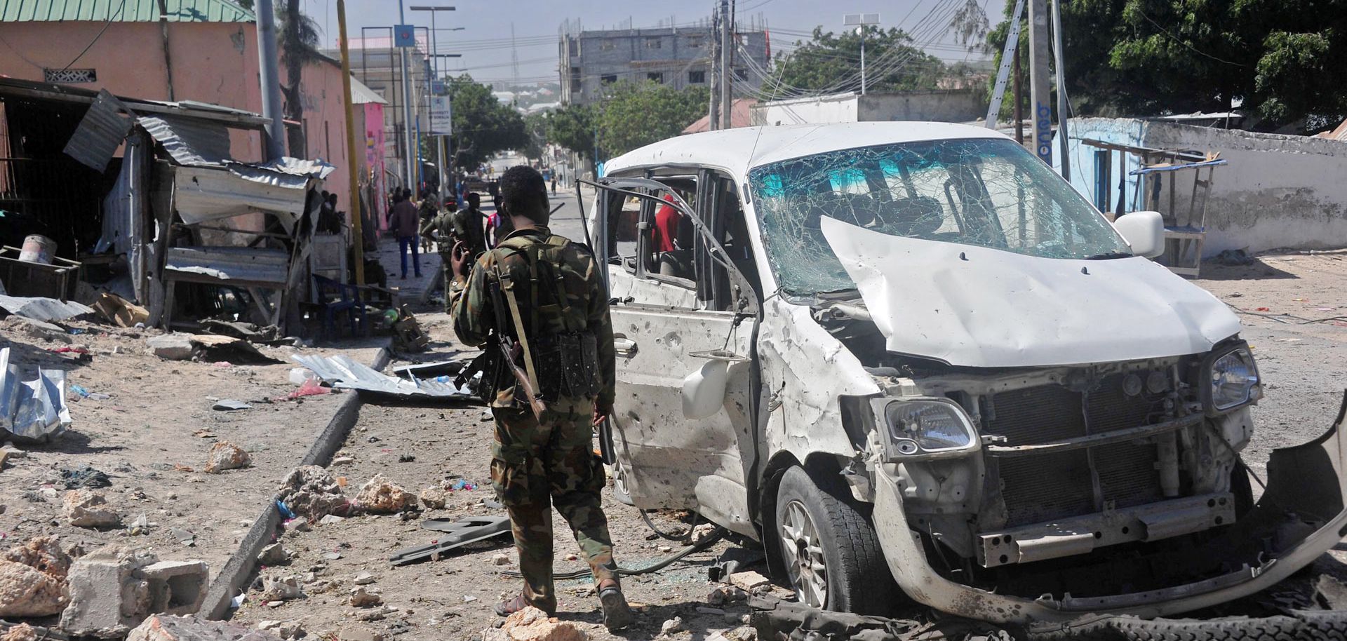 The aftermath of a car bomb that detonated near the Peace Hotel in Mogadishu, Jan. 2. Al Qaeda has survived against the odds, and in places such as Somalia could surge back to power if African Union troops withdraw.