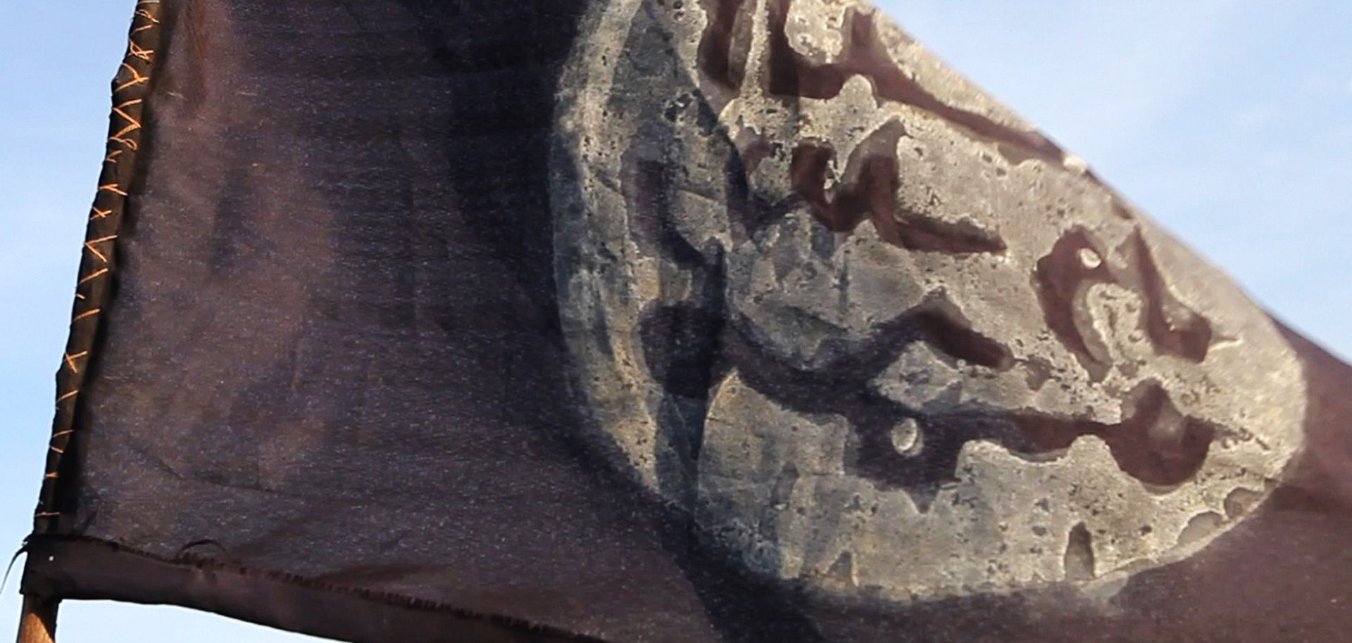 A Boko Haram flag flies over an abandoned command post in Gamboru after Chadian troops drove out the militants Feb. 4.