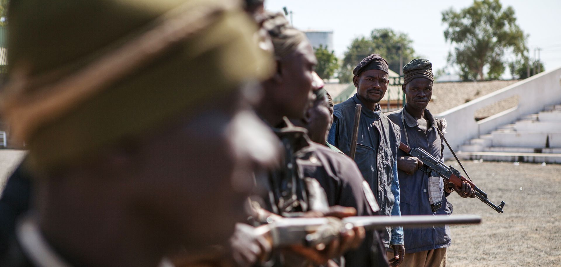 A group of Civilian Joint Task Force members pose in Yola, Adamawa state, on Dec. 4, 2014, after taking part in an operation against Boko Haram.