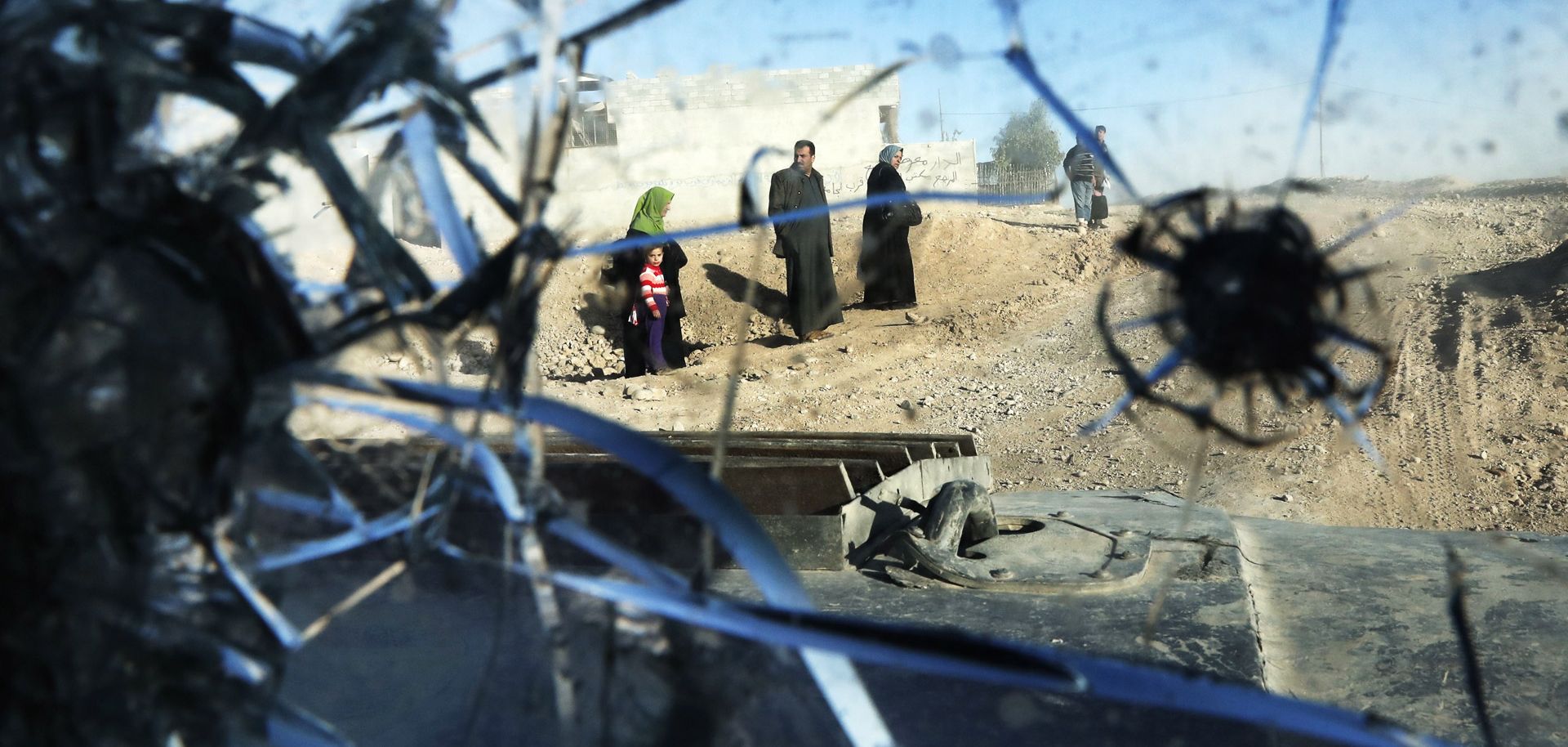 A picture taken through a vehicle's bullet-riddled windshield shows Mosul after Iraqi troops retook most of the city from the Islamic State. The group's so-called caliphate looks nothing like the caliphates of old, which thrived on diversity.
