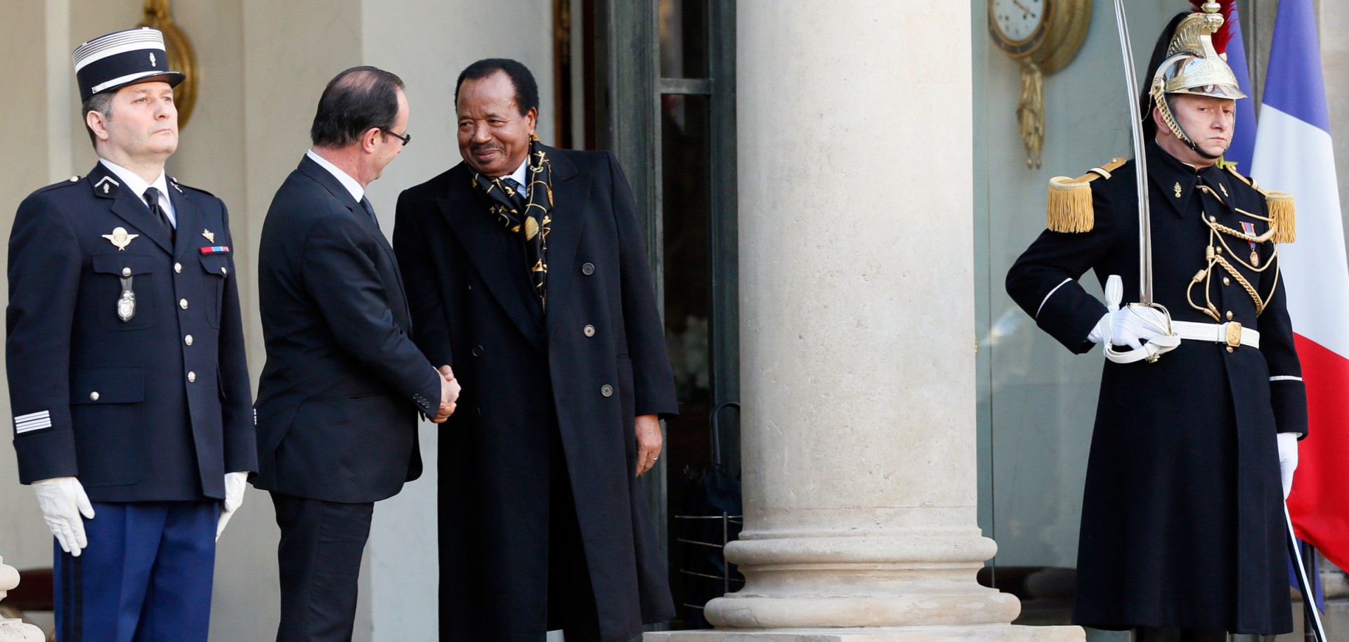 French President Francois Hollande meets Cameroonian President Paul Biya at the Elysee Palace in January 2013. France's colonial legacy in Africa shapes many of today's conflicts. 