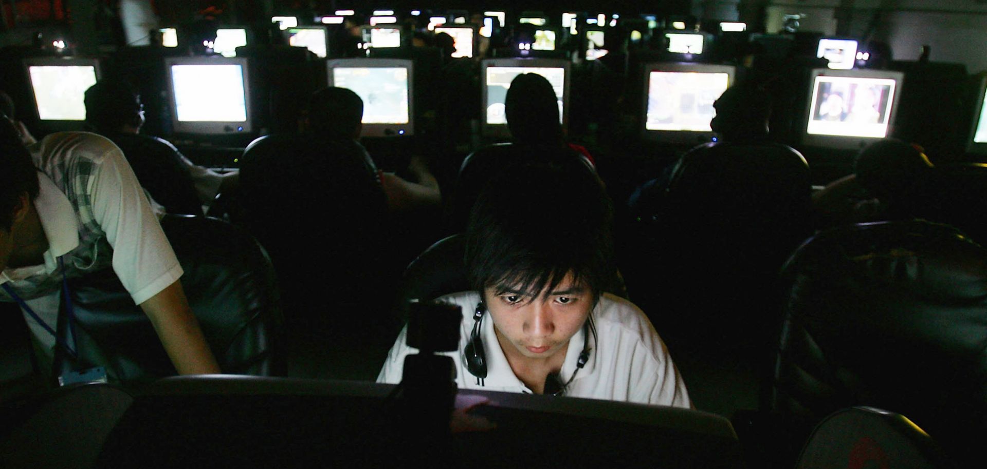 Chinese youngsters play online games overnight at an Internet cafe in Wuhan, Hubei Province.