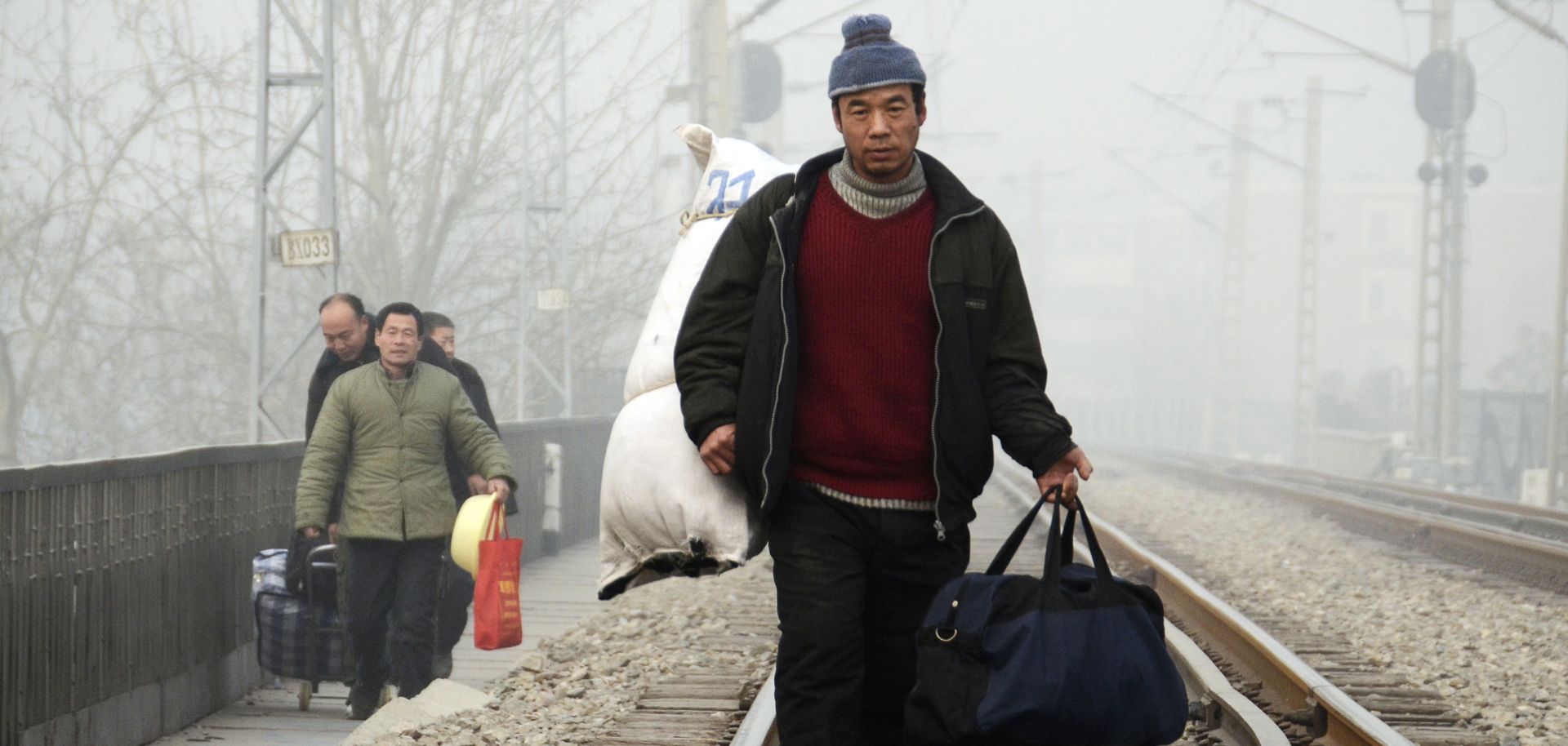 Migrants in China fuel rapid urbanization rates