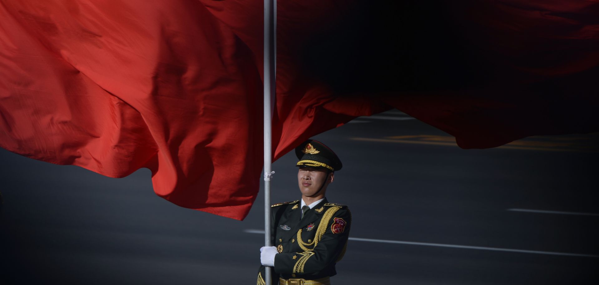 A member of China's honor guard waits to receive Vietnamese President Tran Dai Quang and Chinese President Xi Jinping in Beijing on May 11.