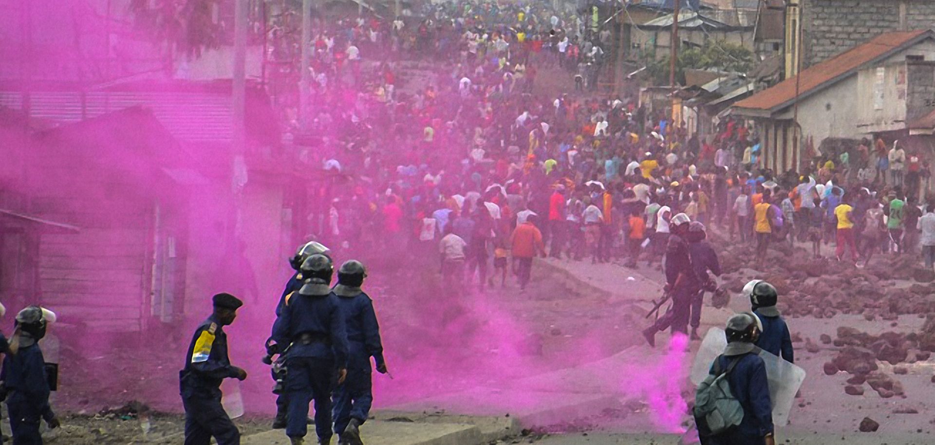 Congolese police launch flares during a demonstration in Goma on Sept. 19. The postponement of the country's presidential election has sparked protests and prompted harsh security crackdowns in many cities, including Kinshasa.