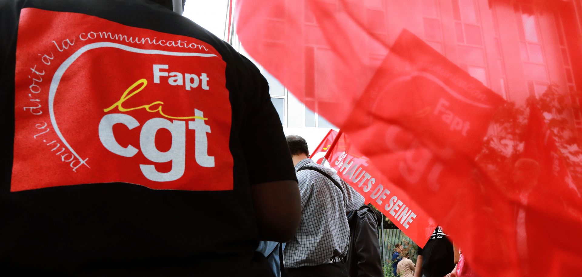 Employees of French telecommunications company SFR take part in a national day of action organized by French unions. Despite their declining membership and fragmentation, French unions still have some potent tools at their disposal.