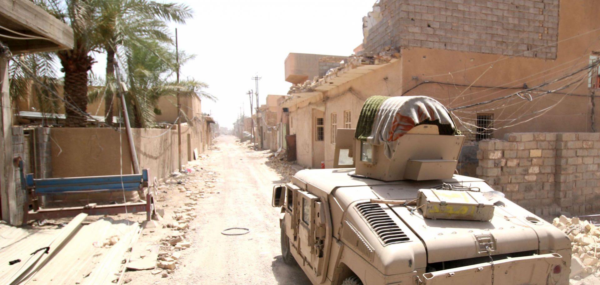 An Iraqi army Humvee on patrol in Fallujah as security forces wrest control from the Islamic State