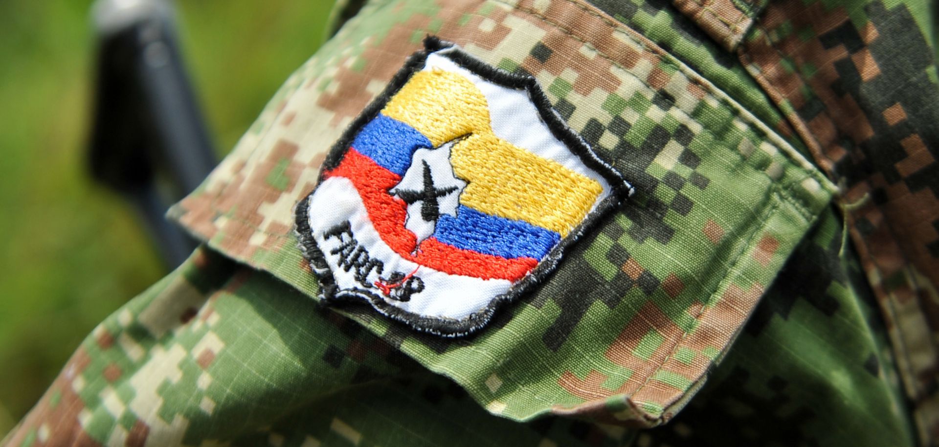 A Revolutionary Armed Forces of Colombia (FARC) uniform displays a shoulder badge in 2013.