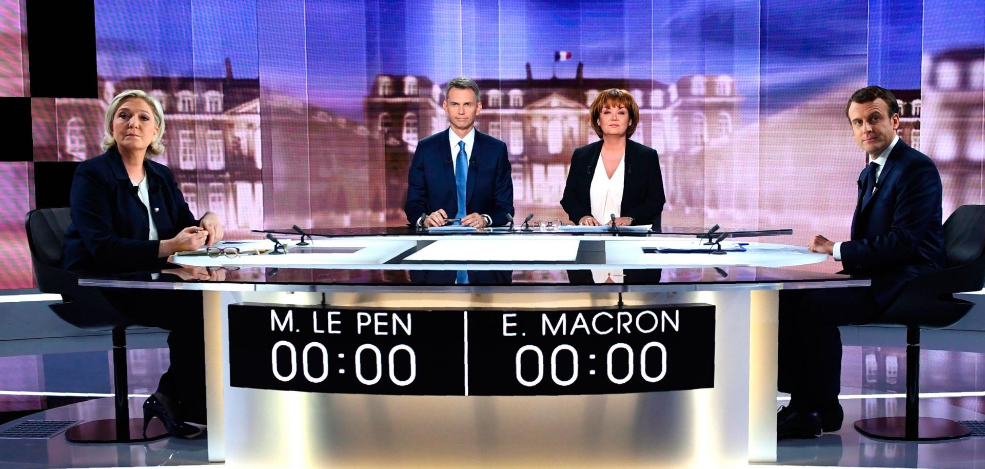 French presidential election candidate Marine Le Pen (L) faces off against Emmanuel Macron. Voters go to the polls on Sunday to determine who will hold one of the most powerful democratically elected positions in the world.