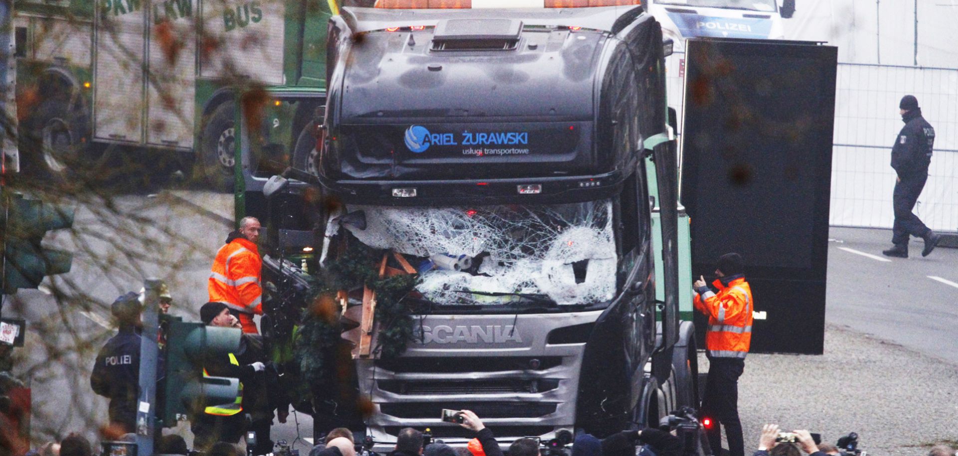 Rescue workers tend to injured bystanders after a truck plowed through a Christmas market in Berlin on Dec. 20, 2016.