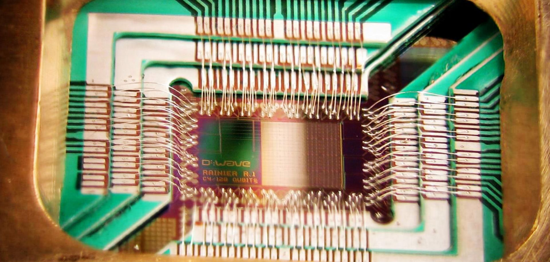 A D-Wave Systems chip designed to operate as a 128-qubit superconducting adiabatic quantum optimization processor.