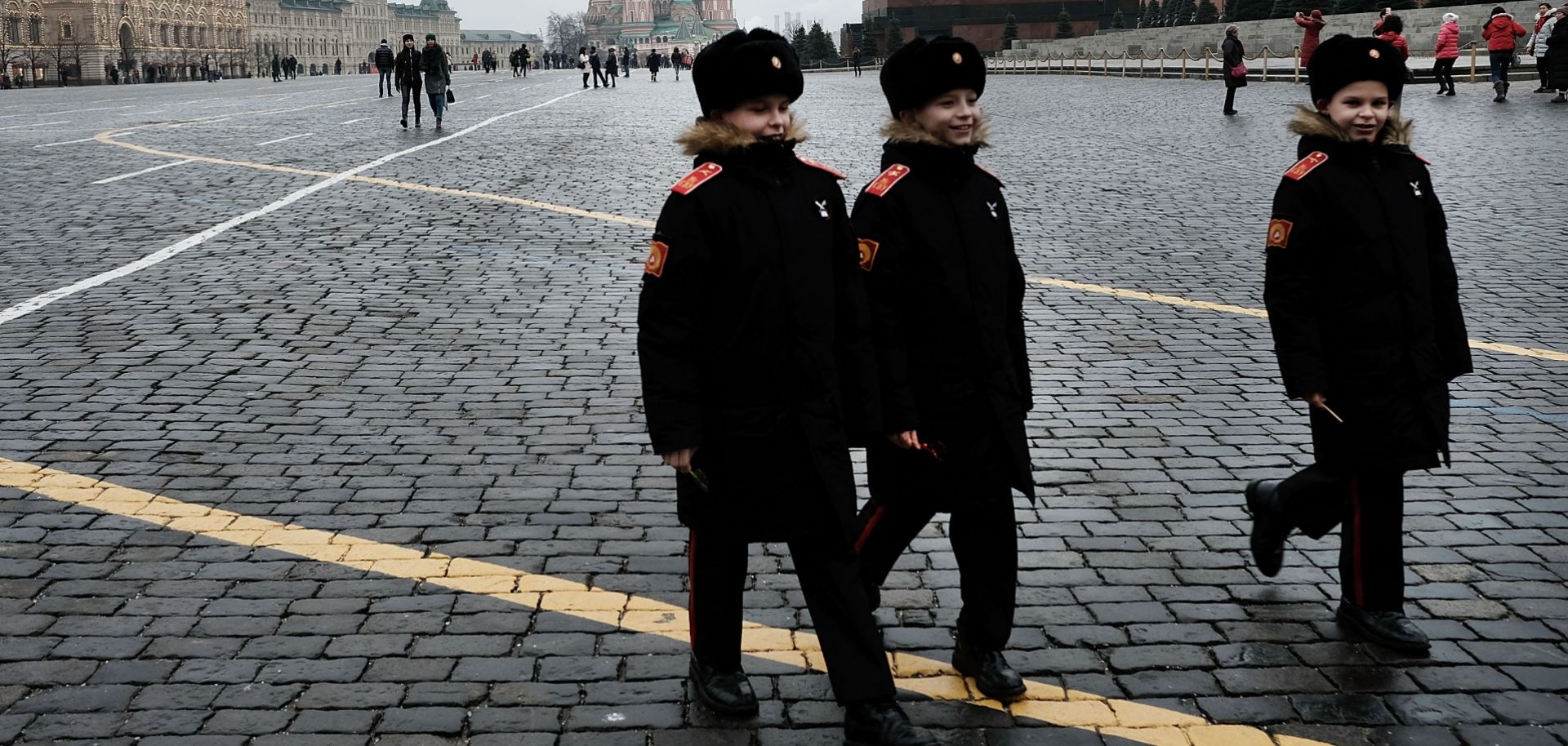 Young boys walk through Moscow's Red Square in military uniforms March 7. In Eurasia, the remnants of the Soviet era are starting to fade as more and more people are born into a post-Soviet world.