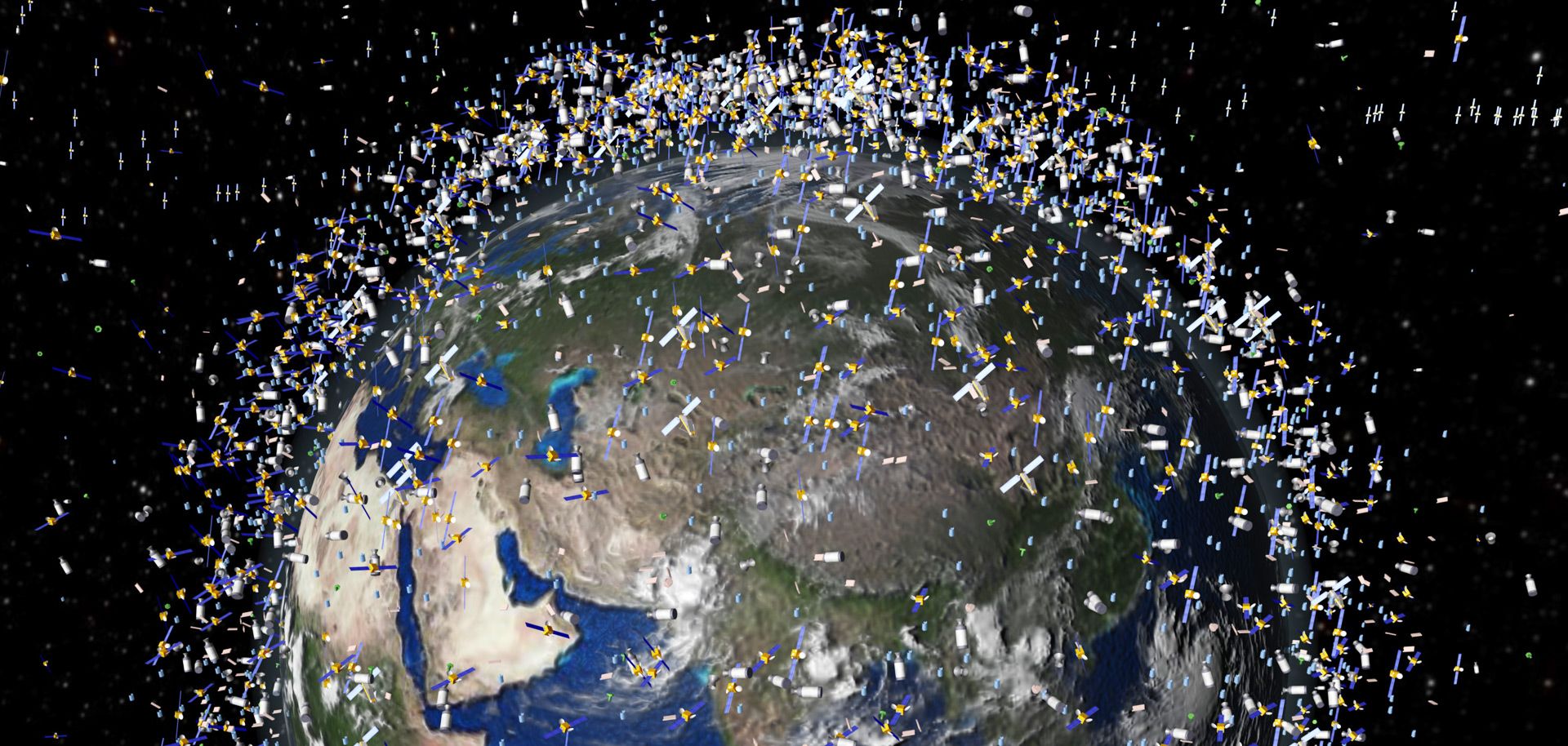 An illustration shows the many objects being tracked in low Earth orbit. Space is becoming more congested, contested and competitive, and there is a growing possibility that battles could start to be waged in space.