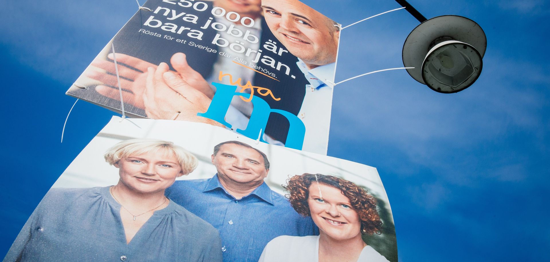 Election posters of Swedish Prime Minister Fredrik Reinfeldt (top) and of the opposition Social Democratic party, featuring candidates Helene Hellmark Knutsson (L), Karin Wanngaard (R) and party leader Stefan Loefven.