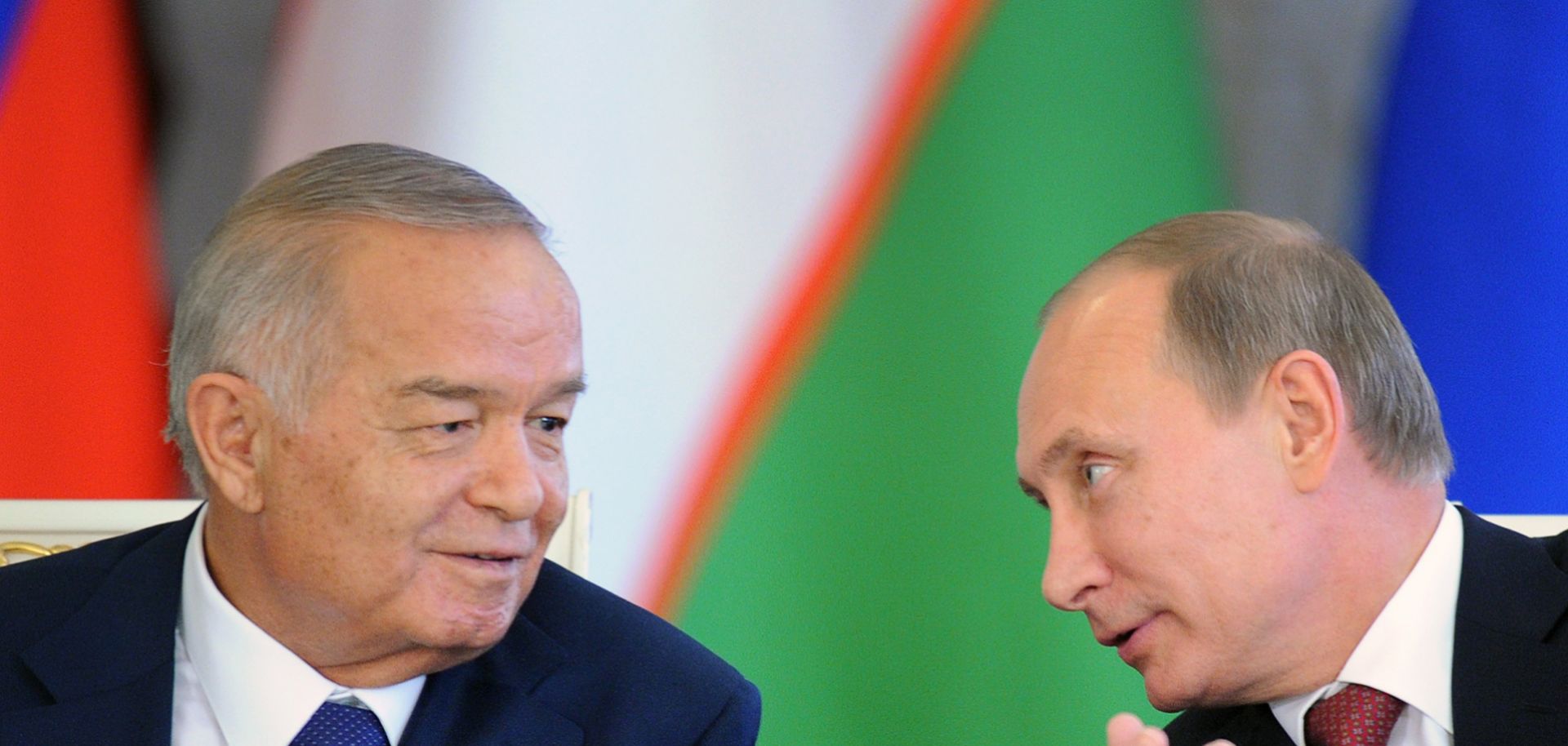 Russian President Vladimir Putin (R) and his Uzbek counterpart Islam Karimov (L) speak in Moscow in 2013. The future of Uzbekistan is not only important to its clans, but also to the greater balance of power in Eurasia.