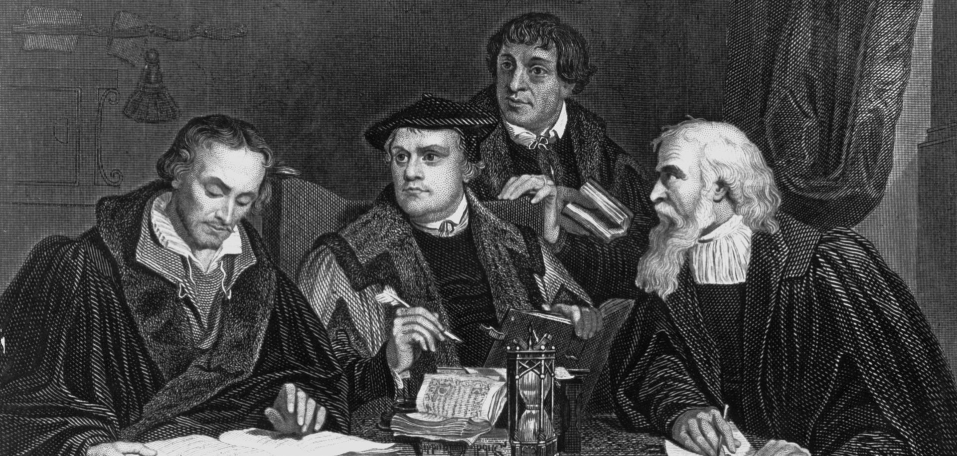 Around 1510, German theologian and reformer Martin Luther, second from the left, sits with his contemporaries.