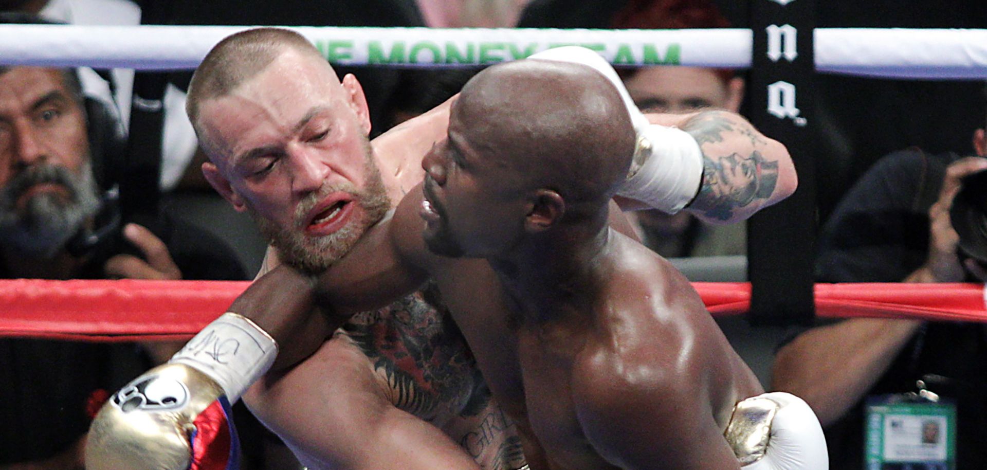 Mixed martial arts star Conor McGregor (L) competes with boxer Floyd Mayweather Jr. in Las Vegas on Aug. 26.
