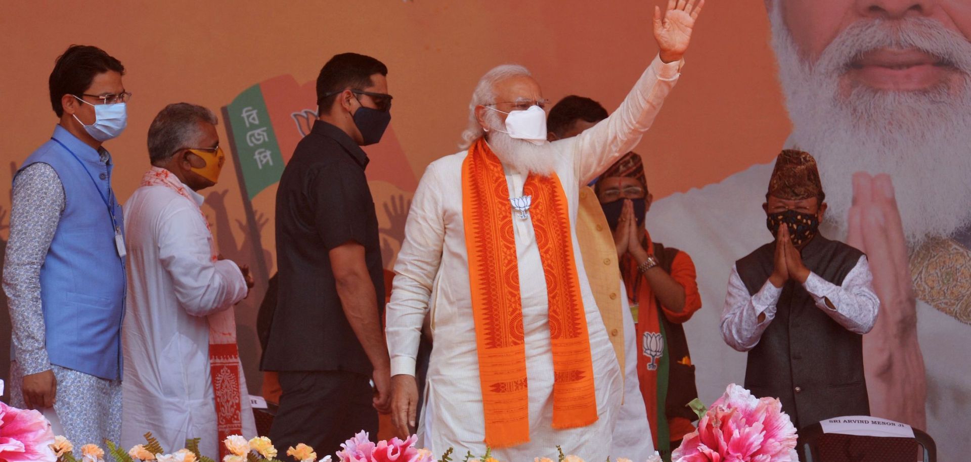 Indian Prime Minister Narendra Modi (C) at a rally during West Bengal state's assembly election April 10, 2021, at Kawakhali on the outskirts of Siliguri.