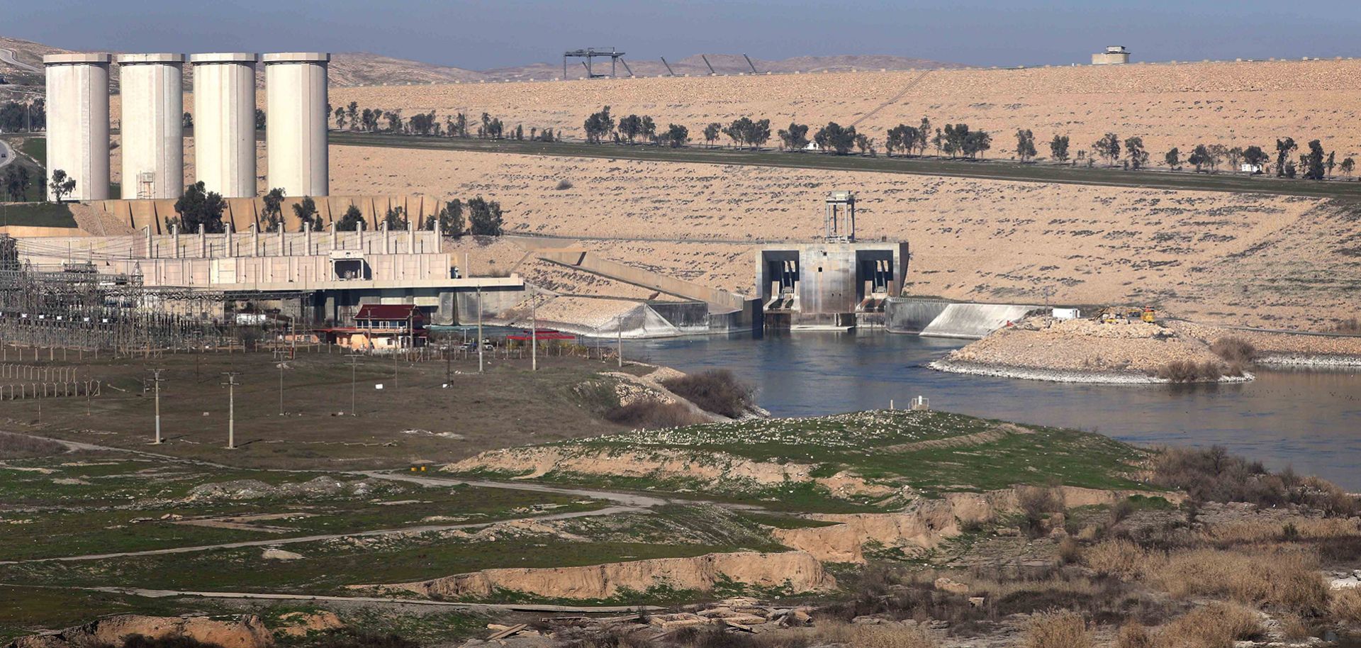 A picture taken on February 1, 2016, shows the Mosul Dam on the Tigris River, around 50 kilometres north of the Iraqi city of Mosul. The United States is monitoring Iraq's largest dam for signs of further deterioration that could point to an impending catastrophic collapse, US army officers said on January 28, 2016. The Islamic State (IS) jihadist group seized the Mosul Dam briefly in 2014, leading to a lapse in maintenance that weakened an already flawed structure, and Baghdad is seeking a company to make 