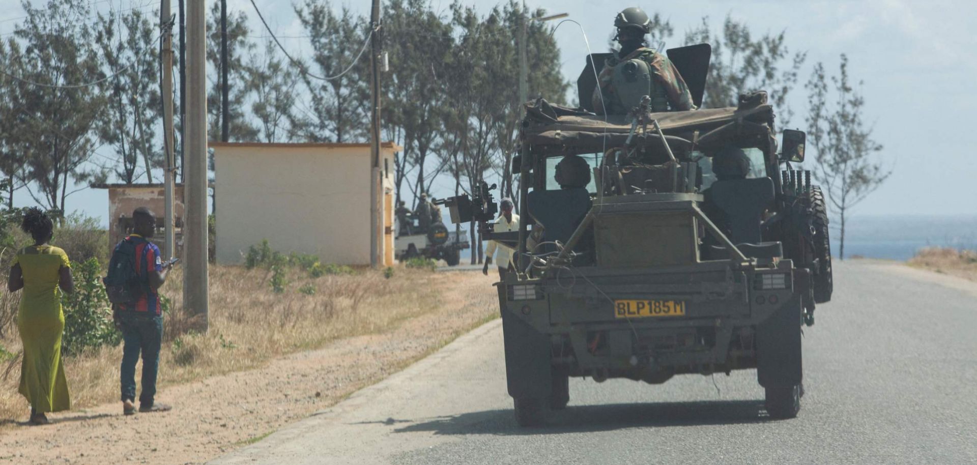 A military convoy from a multinational intervention force on Aug. 5, 2021, in Pemba, Mozambique.