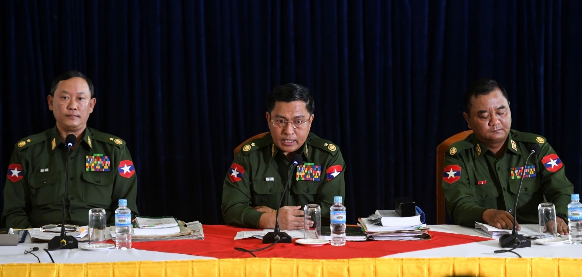 Myanmar army generals Tun Tun Nyi, Soe Naing Oo and Zaw Min Tun (left to right) discuss their intent to thwart constitutional changes by the governing National League for Democracy.