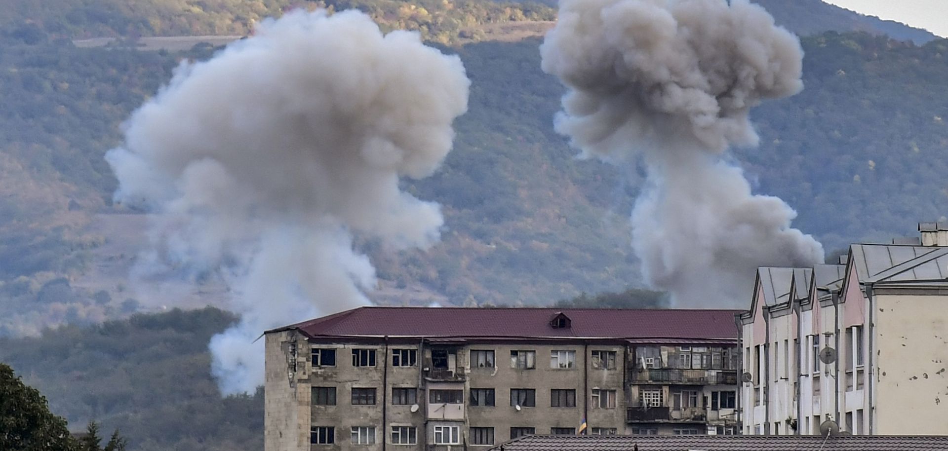 Smoke rises after shelling in Stepanakert on Oct. 9, 2020, during ongoing fighting between Armenia and Azerbaijan over the disputed region of Nagorno-Karabakh.