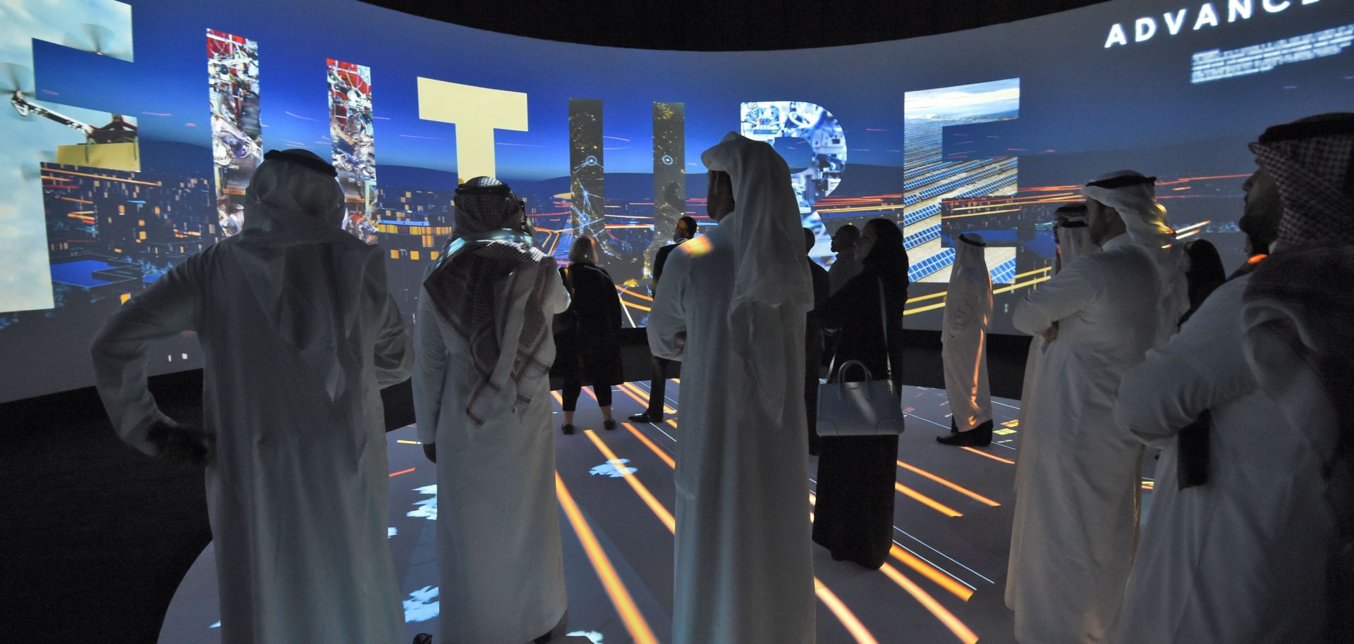 Viewers watch a promotional video touting Saudi Arabia's proposed new megacity, Neom, during an investment conference in Riyadh on Oct. 25, 2017.