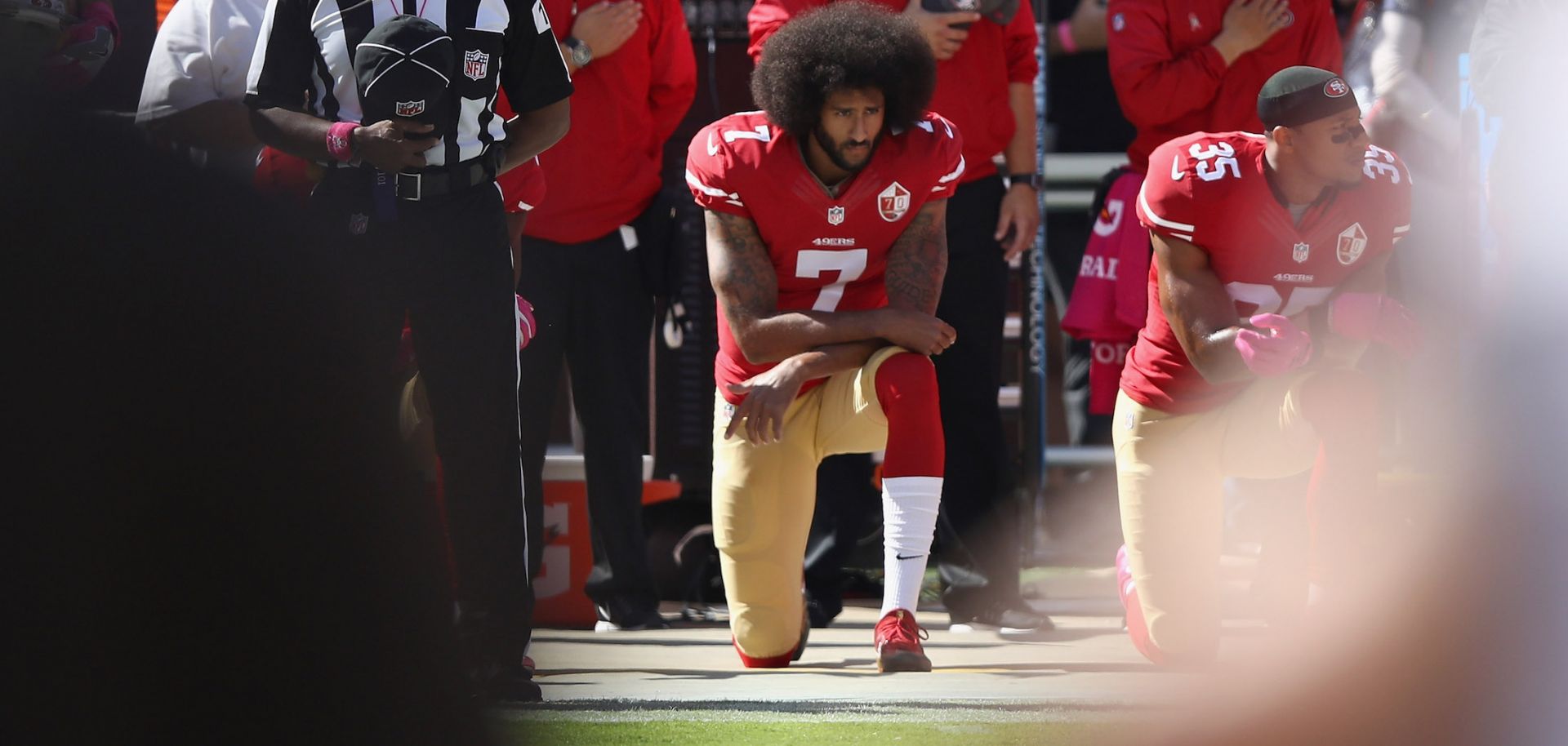 Quarterback Colin Kaepernick kneels during a protest during the playing of the national anthem before a San Francisco 49ers game in 2016.