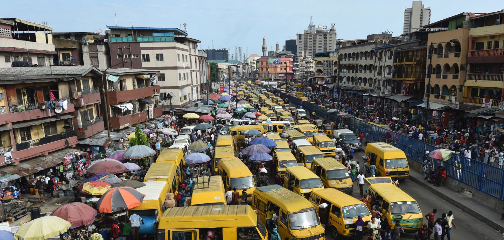 Public transportation minibuses barricade the roads in search of passengers, causing traffic gridlock in Lagos. 