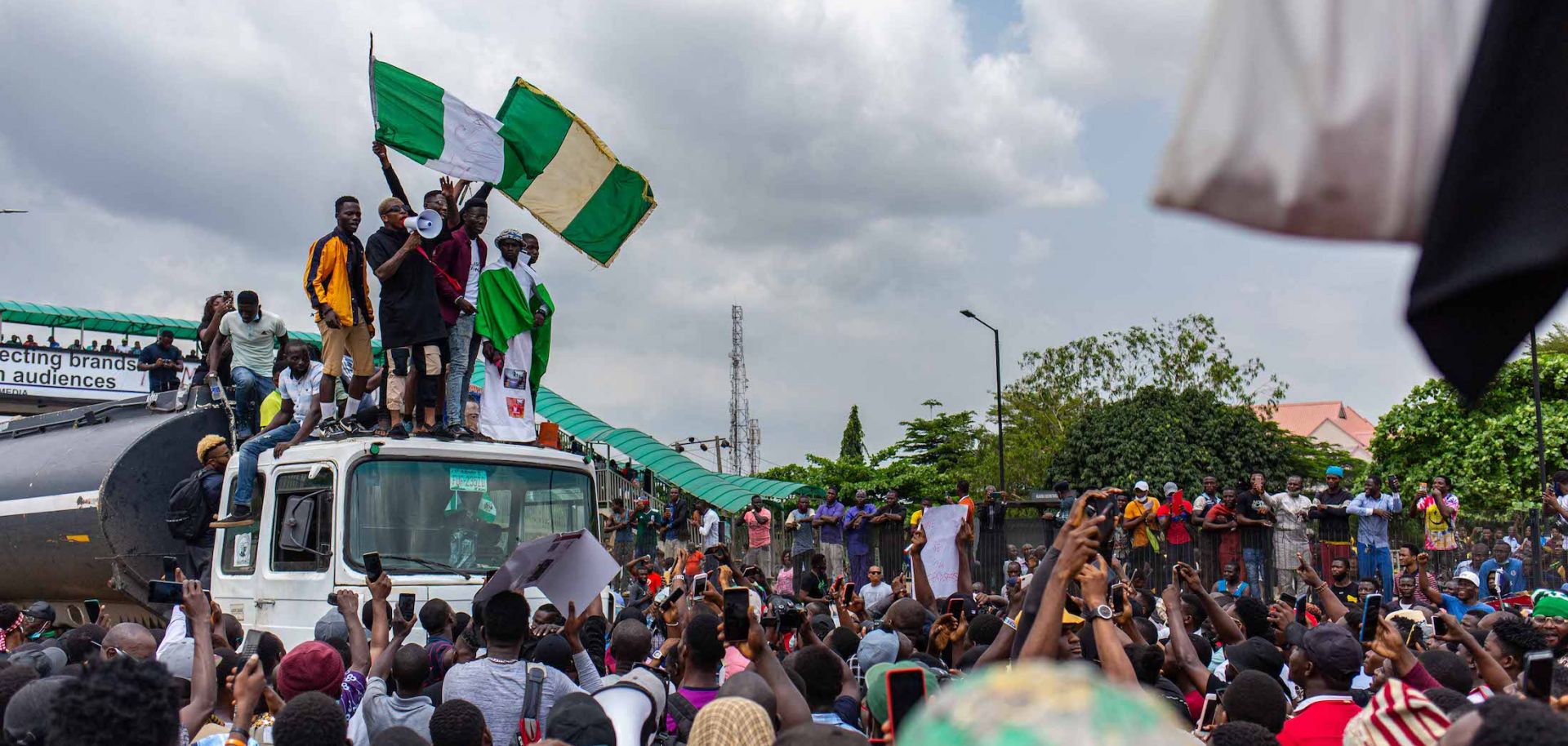 A crowd protests in Lagos, Nigeria, on Oct. 13, 2020, in support of ongoing demonstrations against alleged brutality by the Special Anti-Robbery Squad.