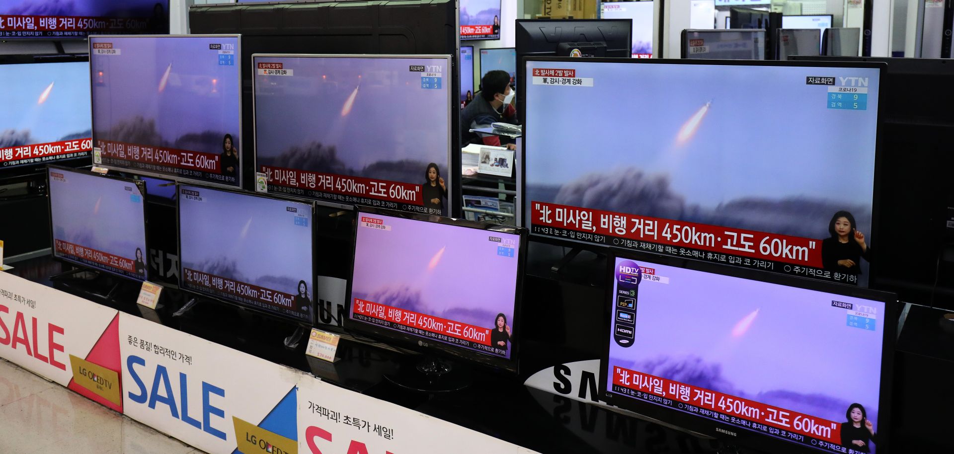TV screens show the launch of North Korean missiles on March 25, 2021, in Seoul, South Korea. 