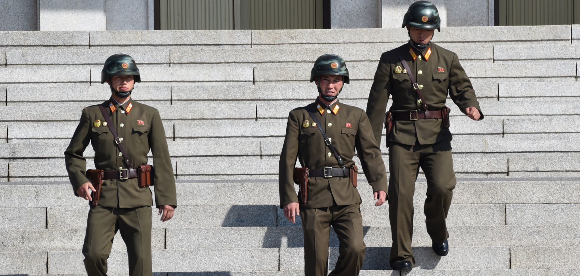 North Korean soldiers look south from the Demilitarized Zone, which separates the two countries on the Korean Peninsula. 