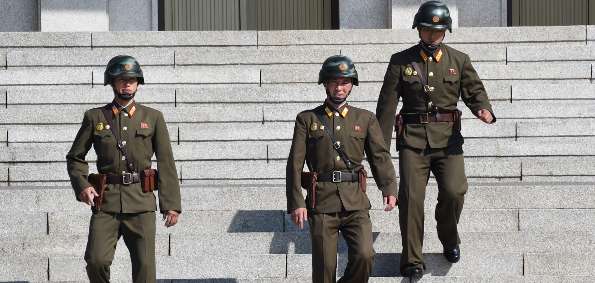 North Korean soldiers look south from the Demilitarized Zone, which separates the two countries on the Korean Peninsula.
