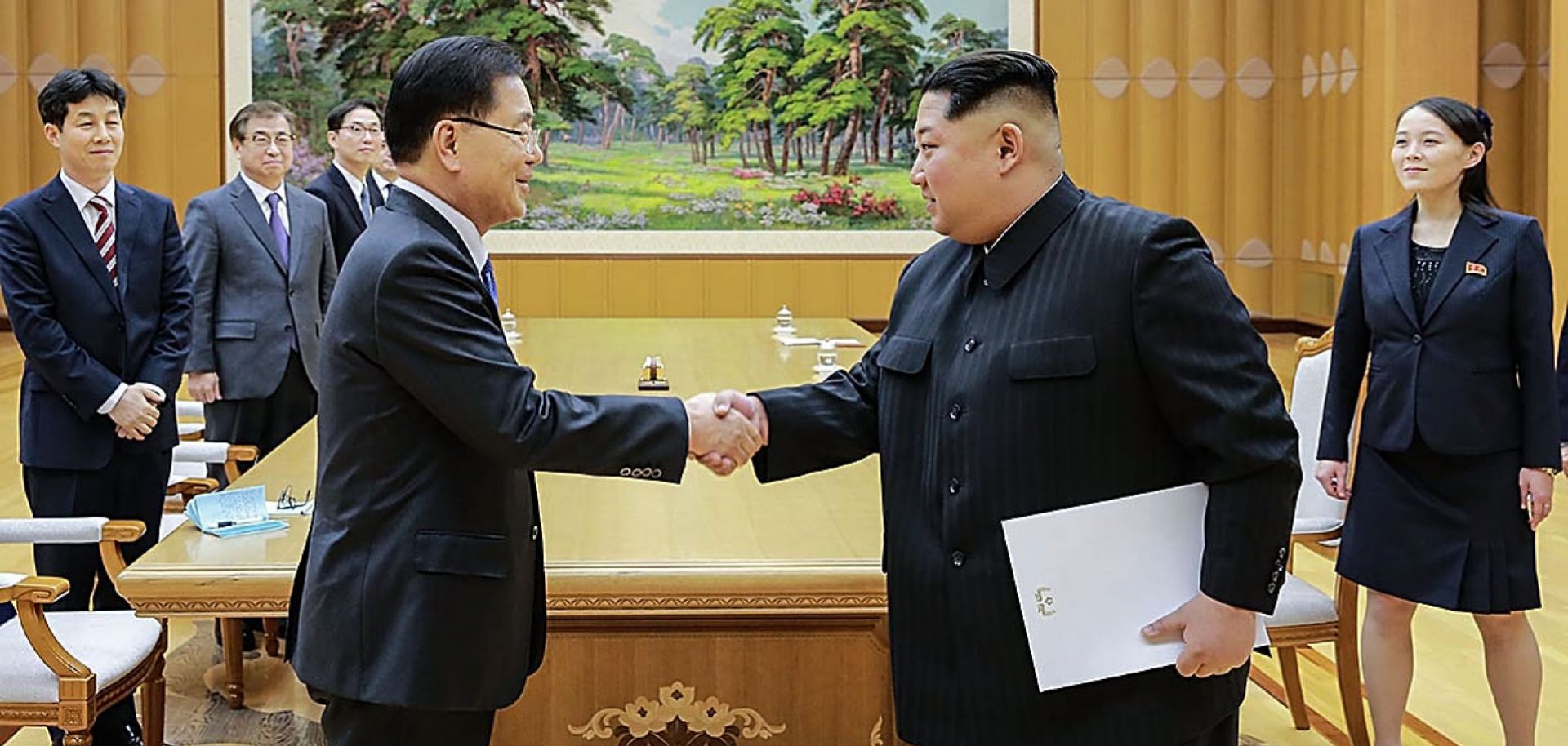 North Korean leader Kim Jong Un, right, shakes hands with South Korean National Security Director Chung Eui Yong in Pyongyang, North Korea, on March 5, 2018.